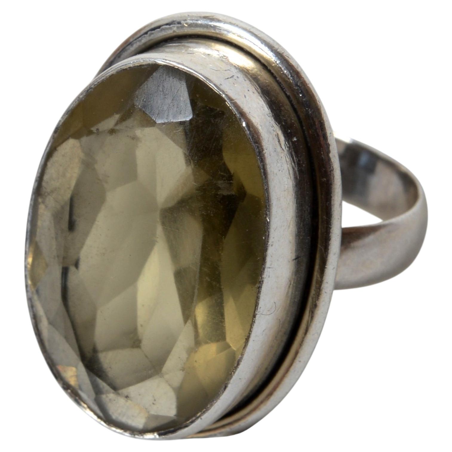 29K Oval Cut Smoky Quartz Solitaire Ring Set in Sterling Silver For Sale