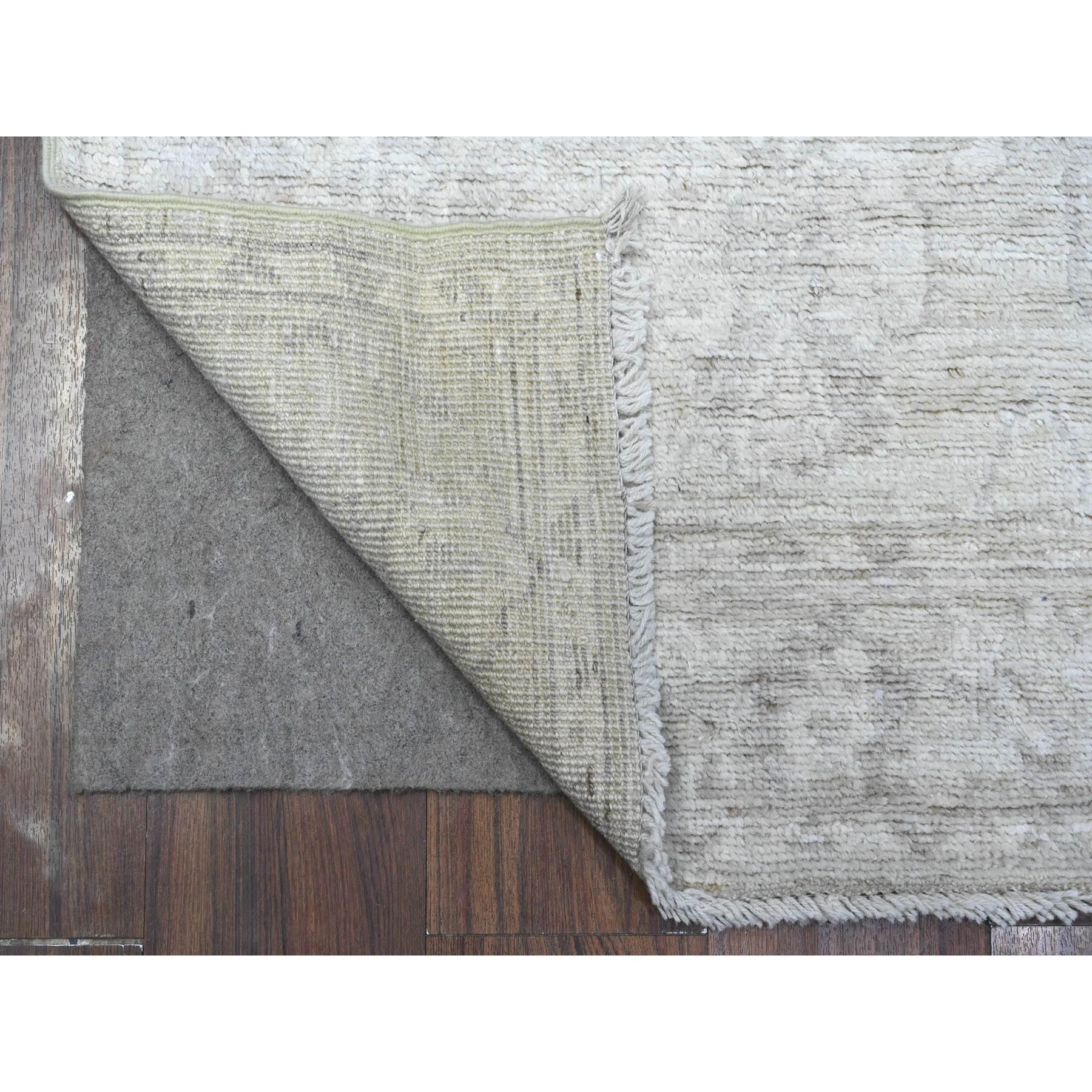 This is a truly genuine one-of-a-kind Angora Oushak, Hand Knotted, Pure Wool, Oriental Rug. It has been Knotted for months and months in the centuries-old weaving craftsmanship techniques by expert artisans.
Primary materials: Wool
Latex: No Pile