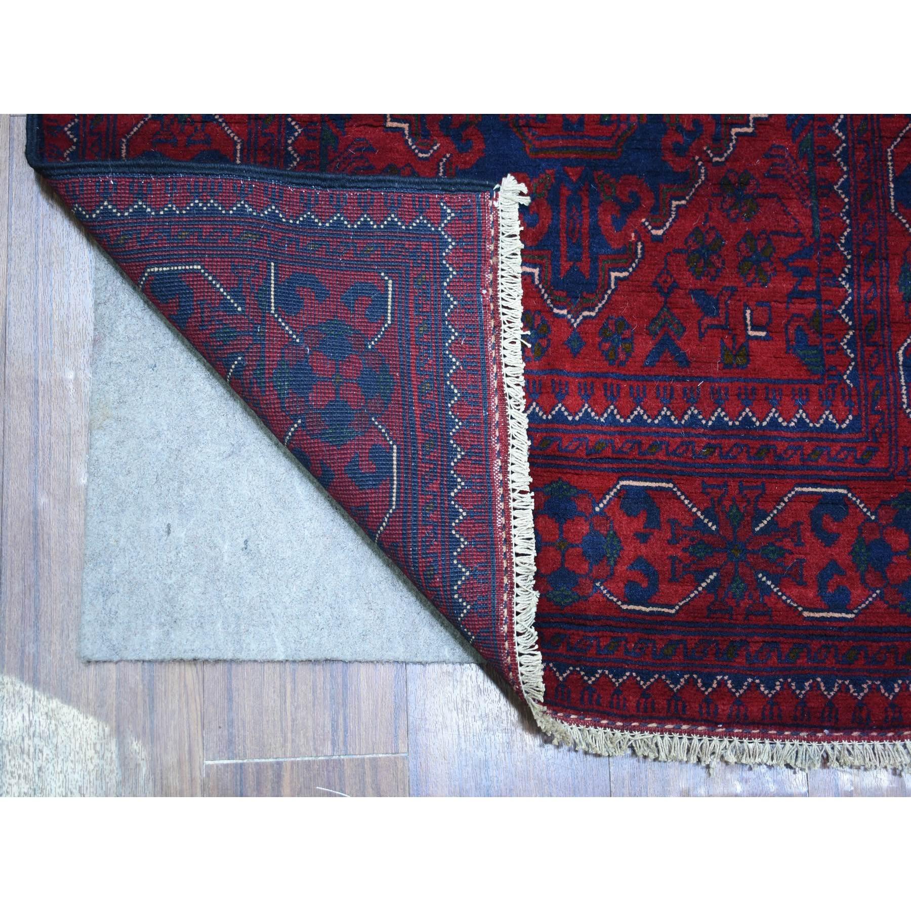 This is a truly genuine one-of-a-kind Deep and Saturated Red, Afghan Khamyab with Geometric Medallions Design, Soft and Shiny Wool Hand Knotted, Runner Oriental Rug. It has been Knotted for months and months in the centuries-old weaving