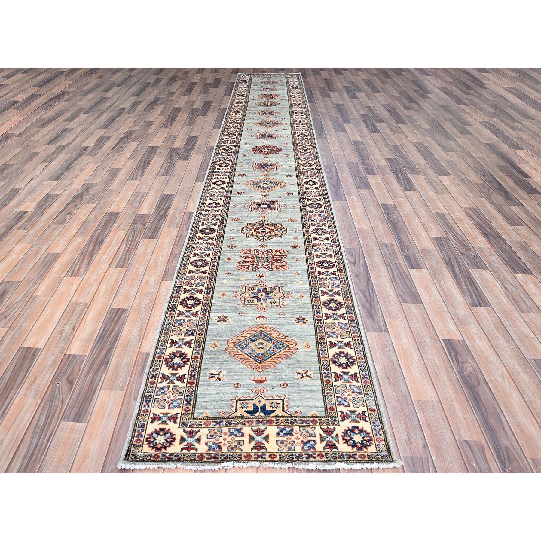 This is a truly genuine one-of-a-kind Super Kazak, Hand Knotted, Pure Wool, and Oriental Rug. It has been Knotted for months and months in the centuries-old weaving craftsmanship techniques by expert artisans.
Primary materials: Wool
Latex: No Pile