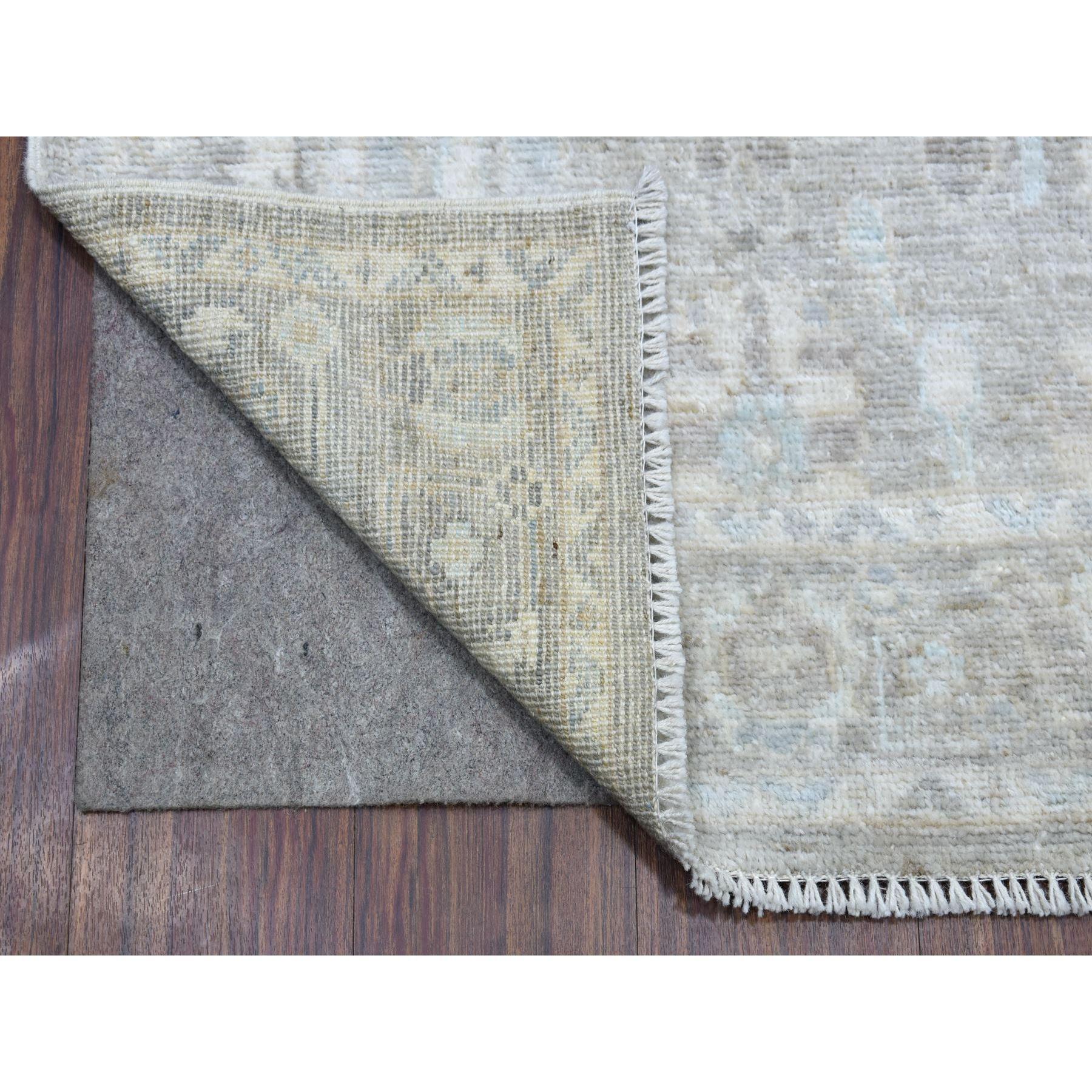 This is a truly genuine one-of-a-kind Gray Hand Knotted Angora Oushak with All Over Design Soft Afghan Wool Oriental XL Runner Rug. It has been Knotted for months and months in the centuries-old weaving craftsmanship techniques by expert