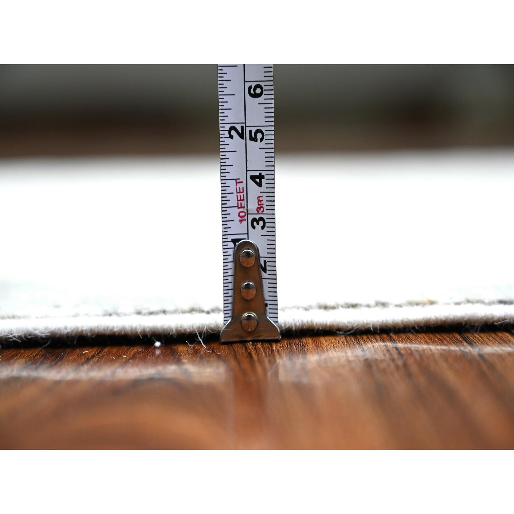 Noué à la main 2'9 