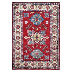2
9 "x4
Karminroter Kazak mit Stammesmedaillon-Design Handgeknüpfter Wollteppich