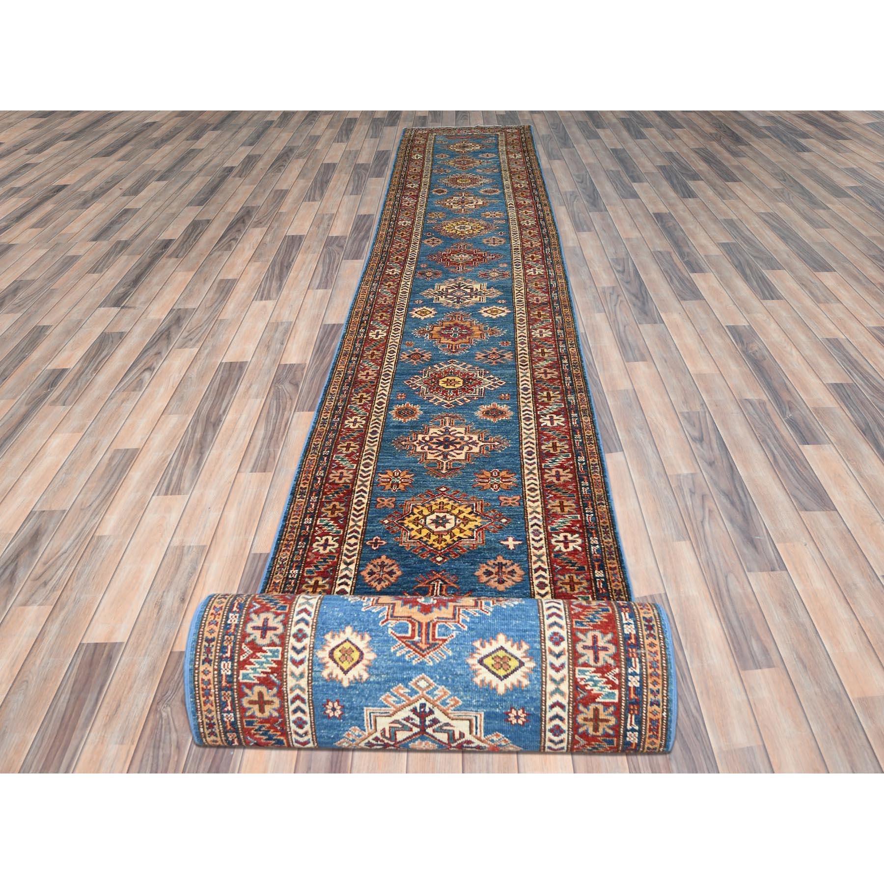 This is a truly genuine one-of-a-kind Denim Blue, Afghan Super Kazak with Large Medallions, Vegetable Dyes Dense Weave, Natural Wool Hand Knotted, XL Runner Oriental Rug. It has been Knotted for months and months in the centuries-old weaving