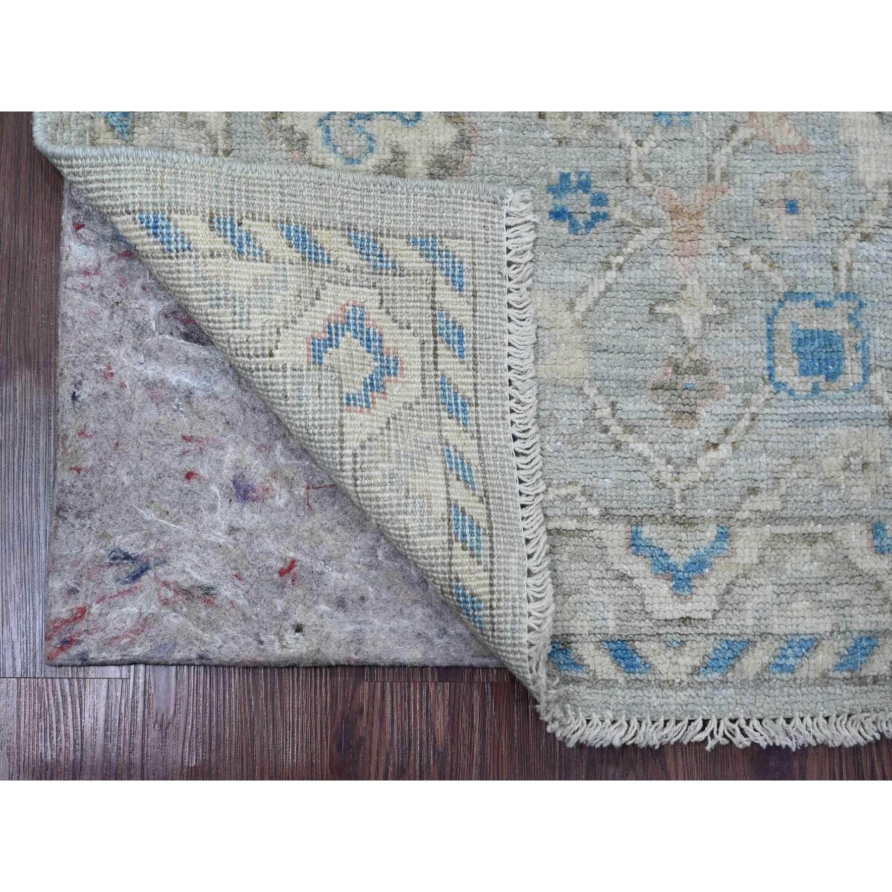 Moonstruck Gray, Hand Knotted, Afghan Angora Oushak with Floral Pattern, Veggie Dyes, 100% Wool, Runner, Oriental Rug
Primary materials: Wool
Latex: No Pile 
height: 0.25 Inches
Style: Transitional
Primary color: Grey
Secondary colors: Blue, Ivory,