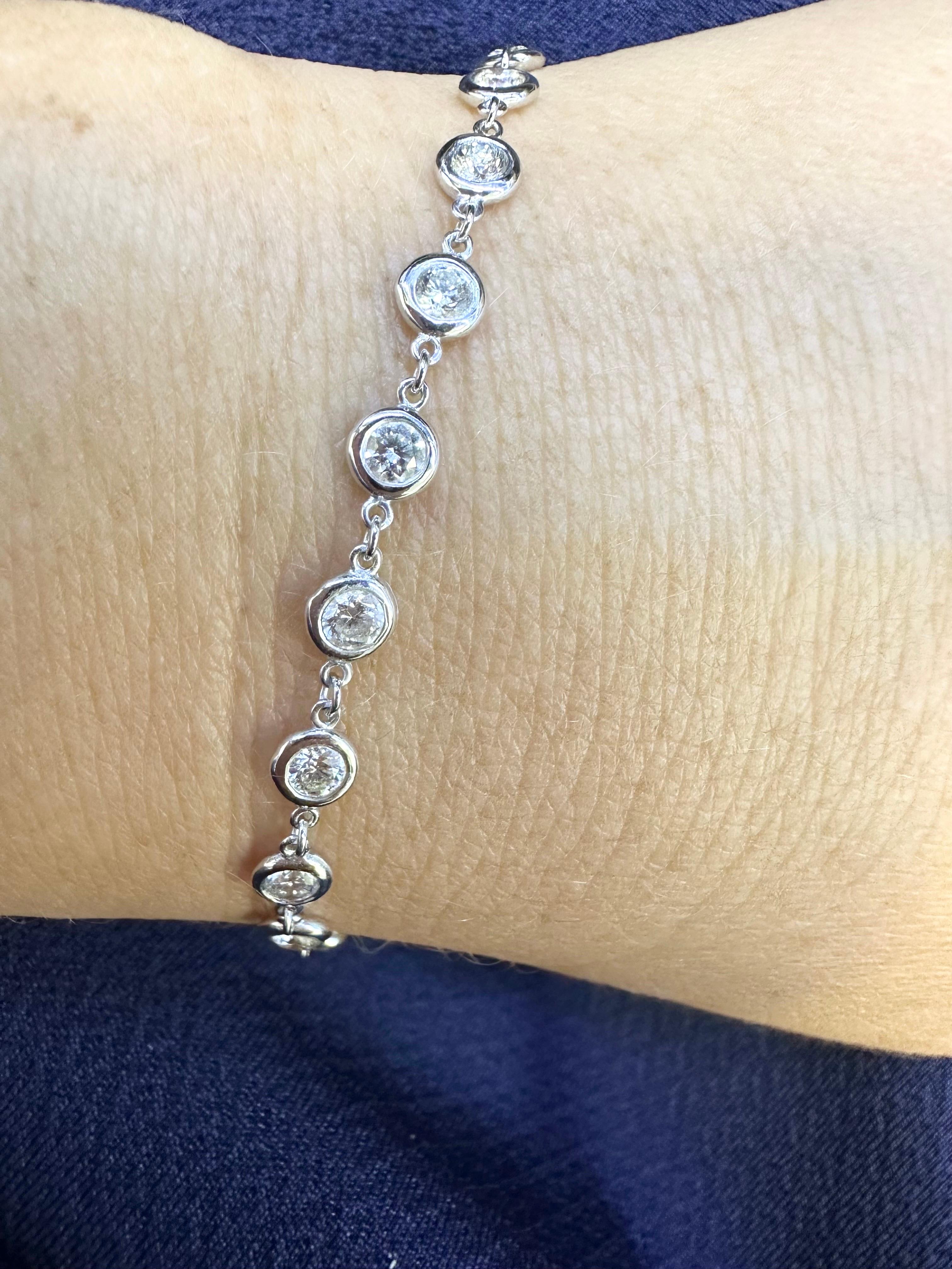 Bezel set bracelet 2 carats of Si clarity diamonds in 14KT white gold.
Certificate of authenticity comes with purchase!

ABOUT US
We are a family-owned business. Our studio in located in the heart of Boca Raton at the International Jewelers