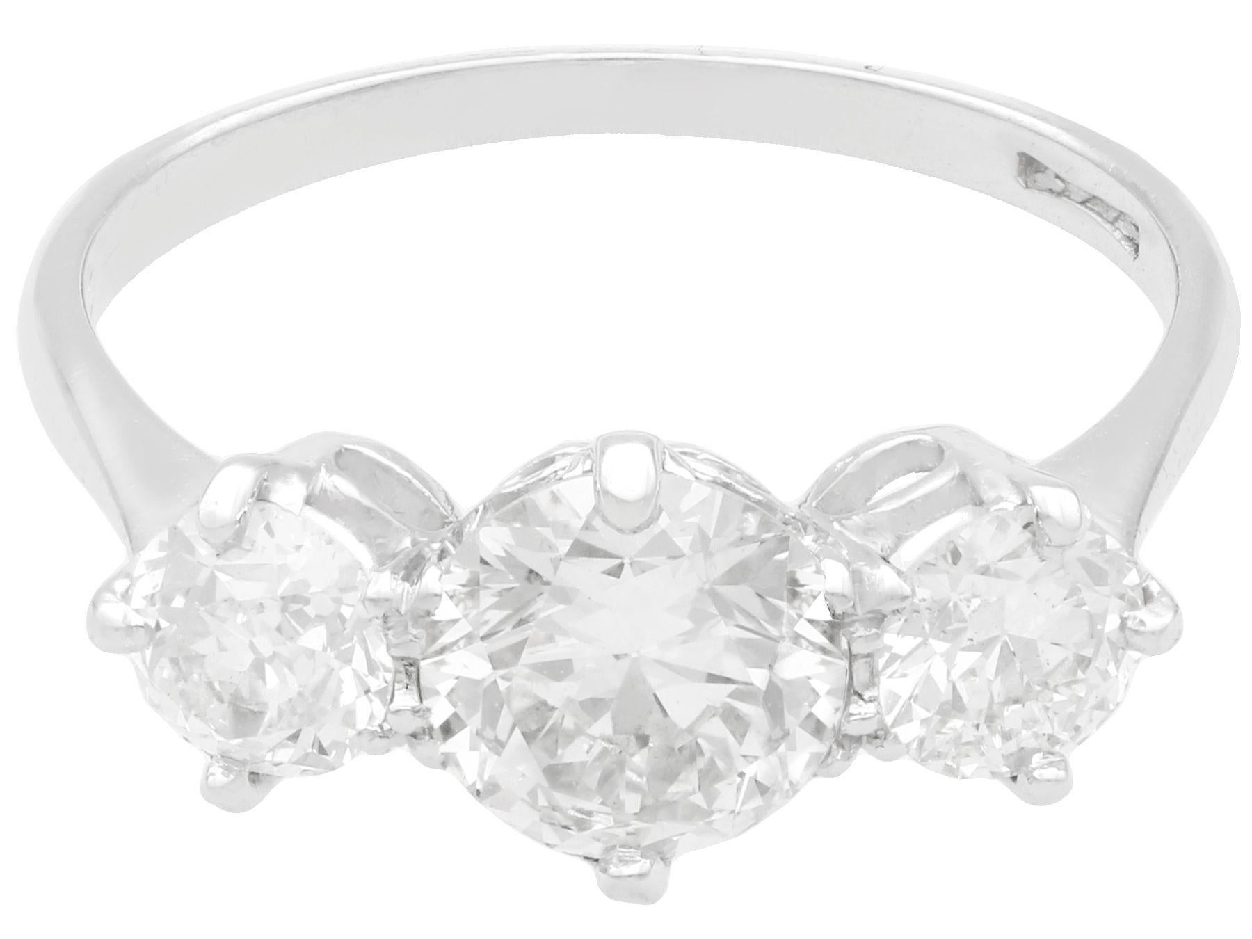 Round Cut 2ct Diamond and Platinum Trilogy Ring For Sale