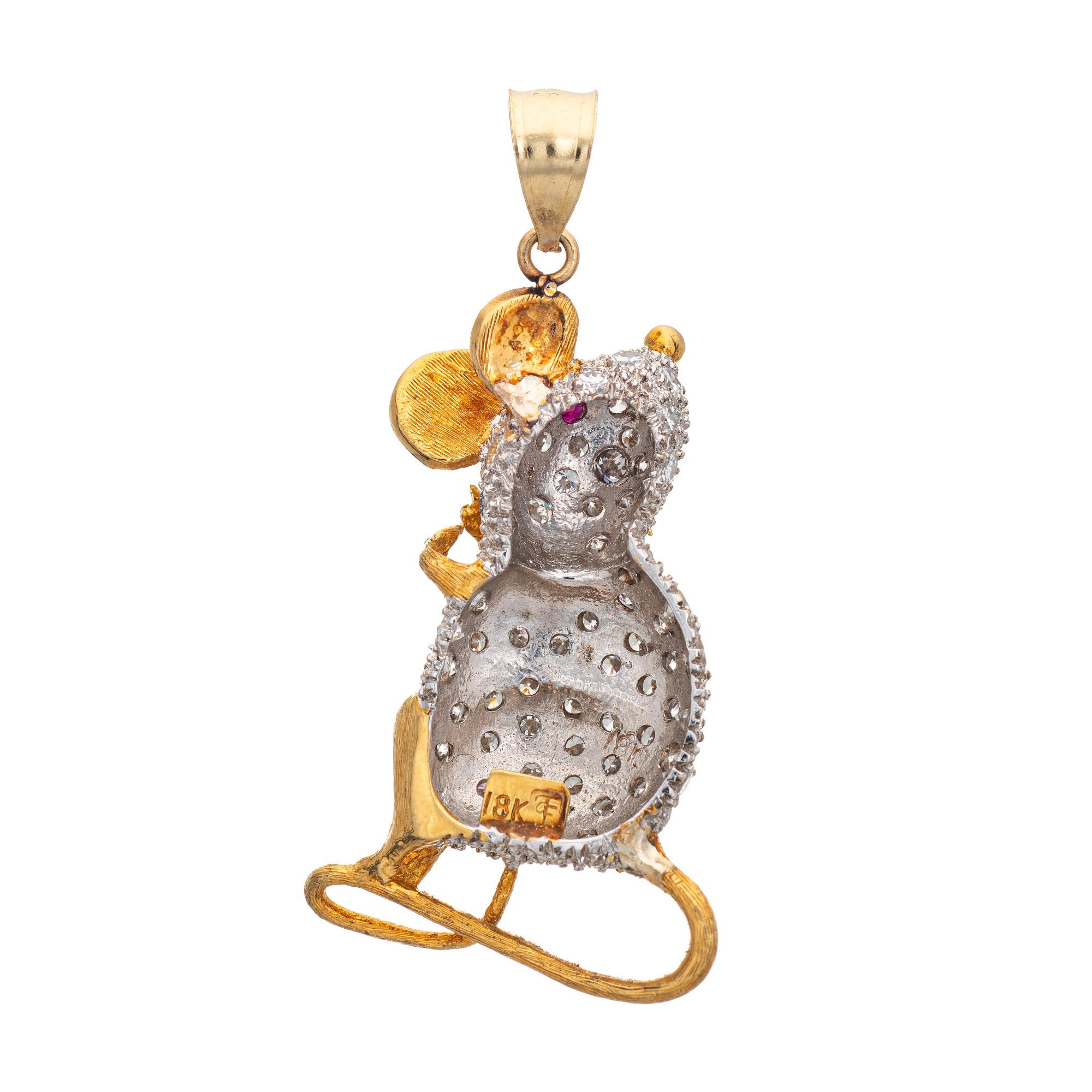 Finely detailed vintage diamond mouse pendant crafted in 18k yellow & white gold.  

Diamonds total an estimated 2 carats (estimated at F-G color and VS1-2 clarity). One estimated 0.02 carat ruby is set into the eye.

The finely detailed charm