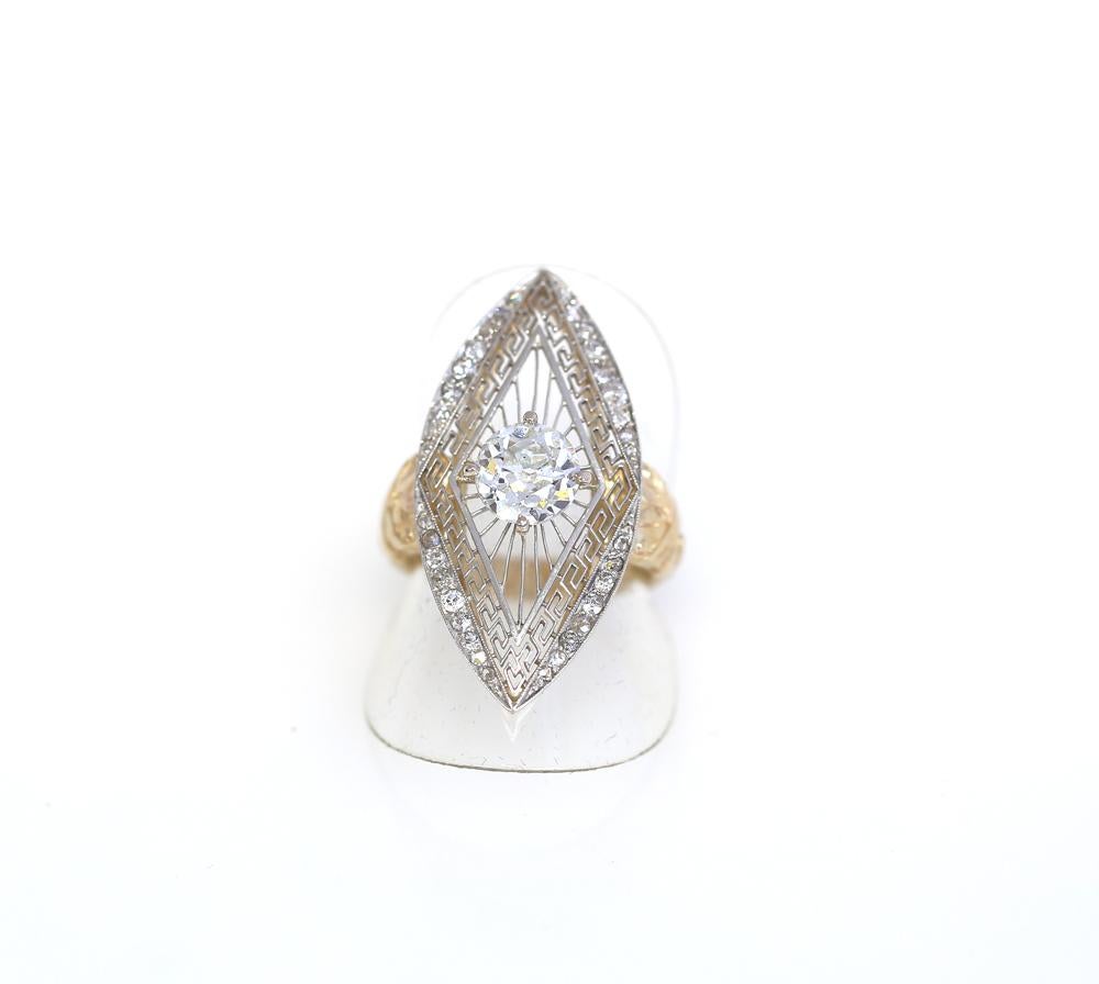 2 Ct Diamond Russian Platinum with Yellow Gold Ring. 
Platinum and Yellow Gold used together was a common technique in that period in Russia. The grid and Diamond cast is Platinum, while the rest of the ring is Gold with fine ornamentation. 

Center