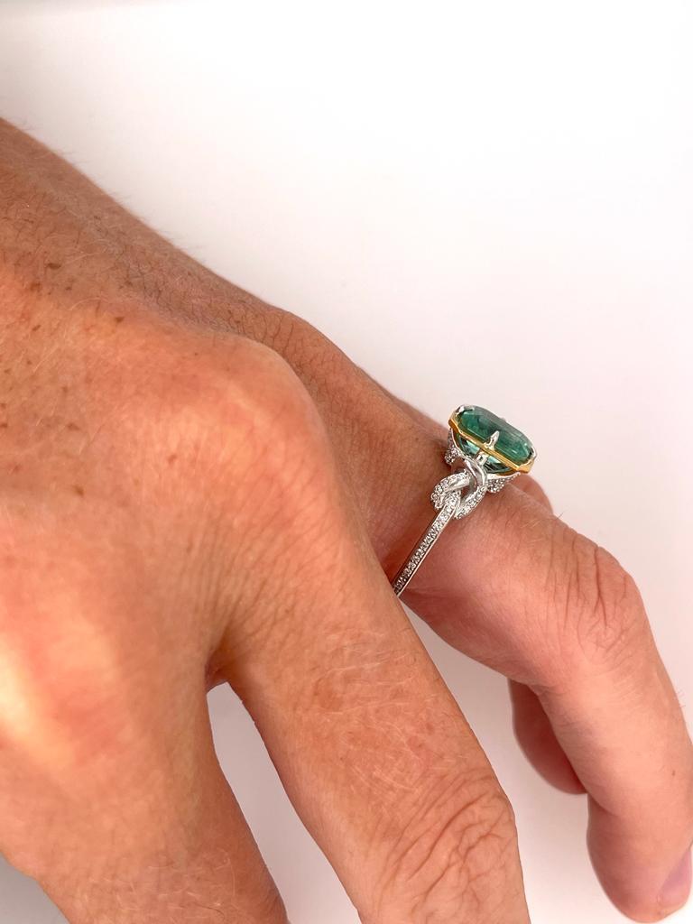 Women's or Men's 2ct Emerald and diamond Forget Me Knot ring in platinum and 22k gold