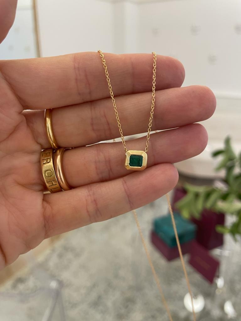 Emerald Cut 2ct emerald bezel set pendant with slider chain in 18k gold  For Sale