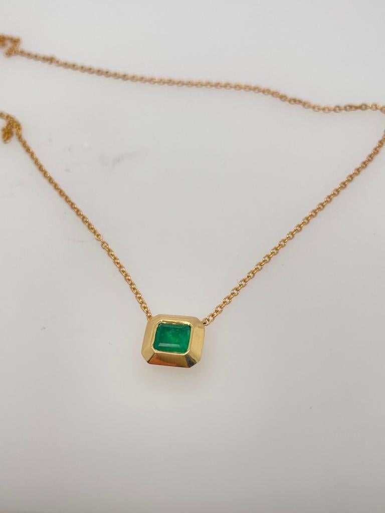 Women's or Men's 2ct emerald bezel set pendant with slider chain in 18k gold  For Sale