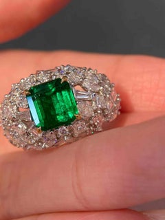 2ct Emerald Center with 2.20ct Multi-Shape White Diamond Side Stones Ring in 18k