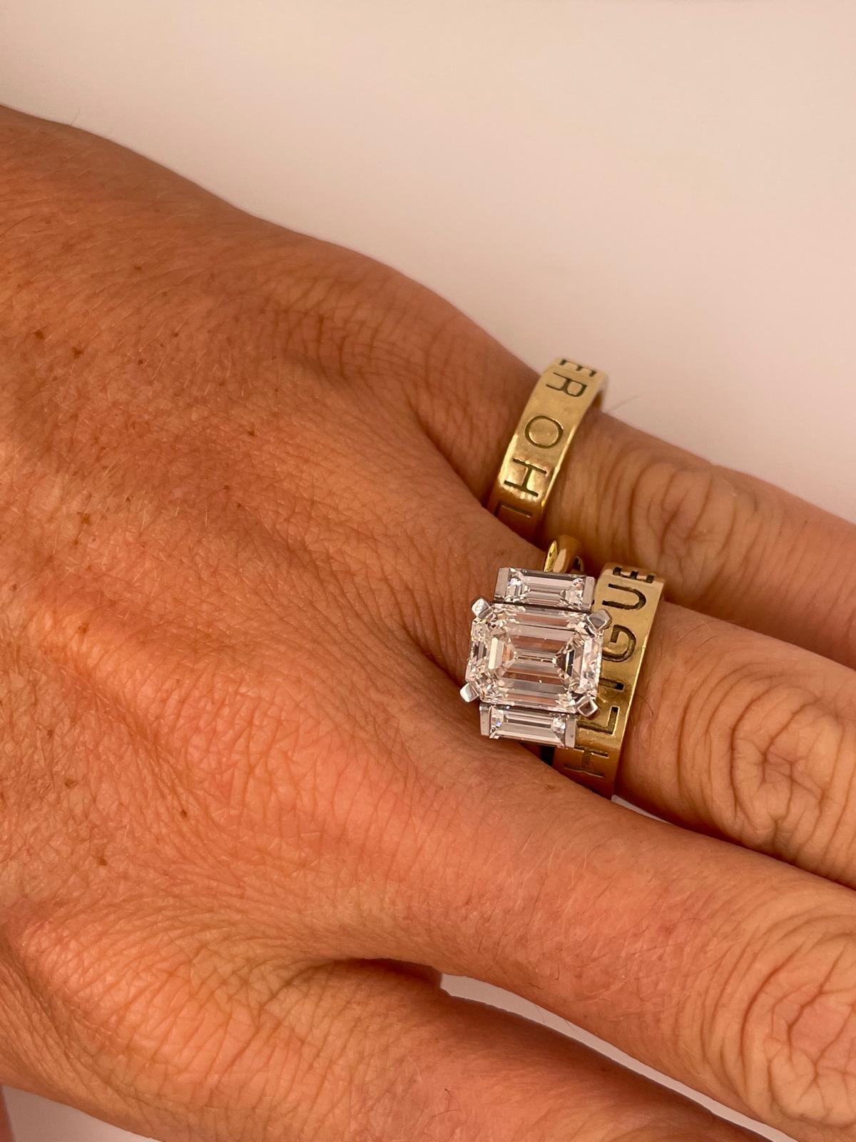 2ct Emerald cut and baguette three stone style classic ring in 18k gold  For Sale 10