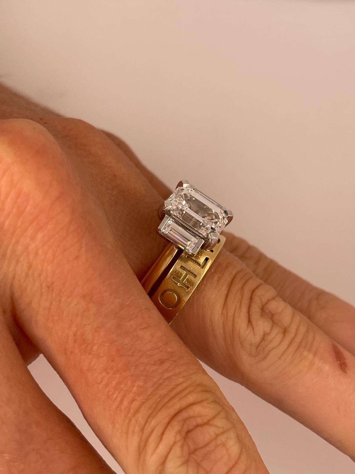 2ct Emerald cut and baguette three stone style classic ring in 18k gold  For Sale 2