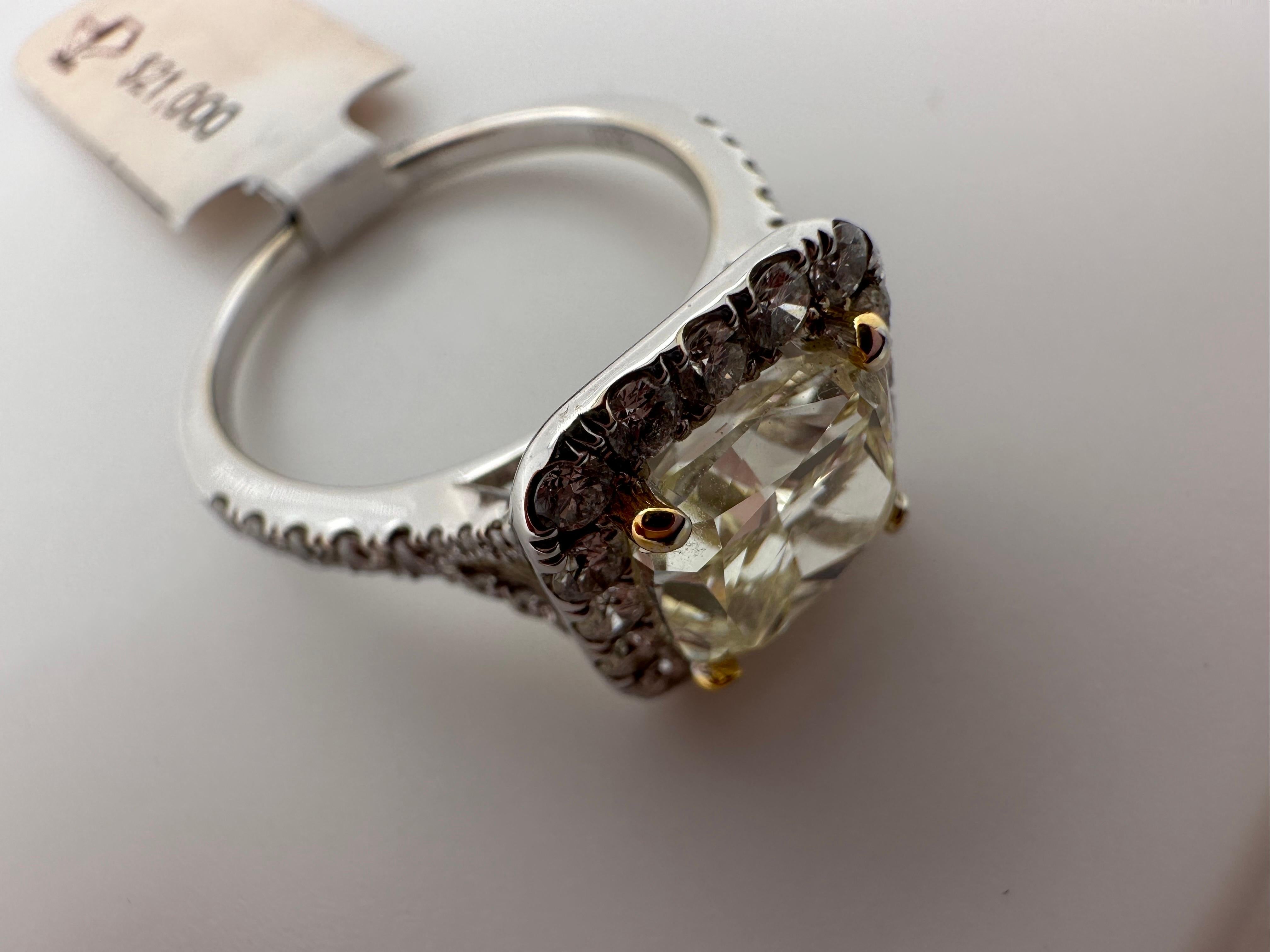 Beautiful engagement diamond ring in 18KT white gold, classical beauty!

Metal Type: 18KT
Natural Side Diamond(s):
Color: F-G
Cut:Round Brilliant
Carat: 0.50ct
Clarity: VS

Natural Center Diamond(s): 
Color: Fancy Yellow
Cut:Emerald
Carat: