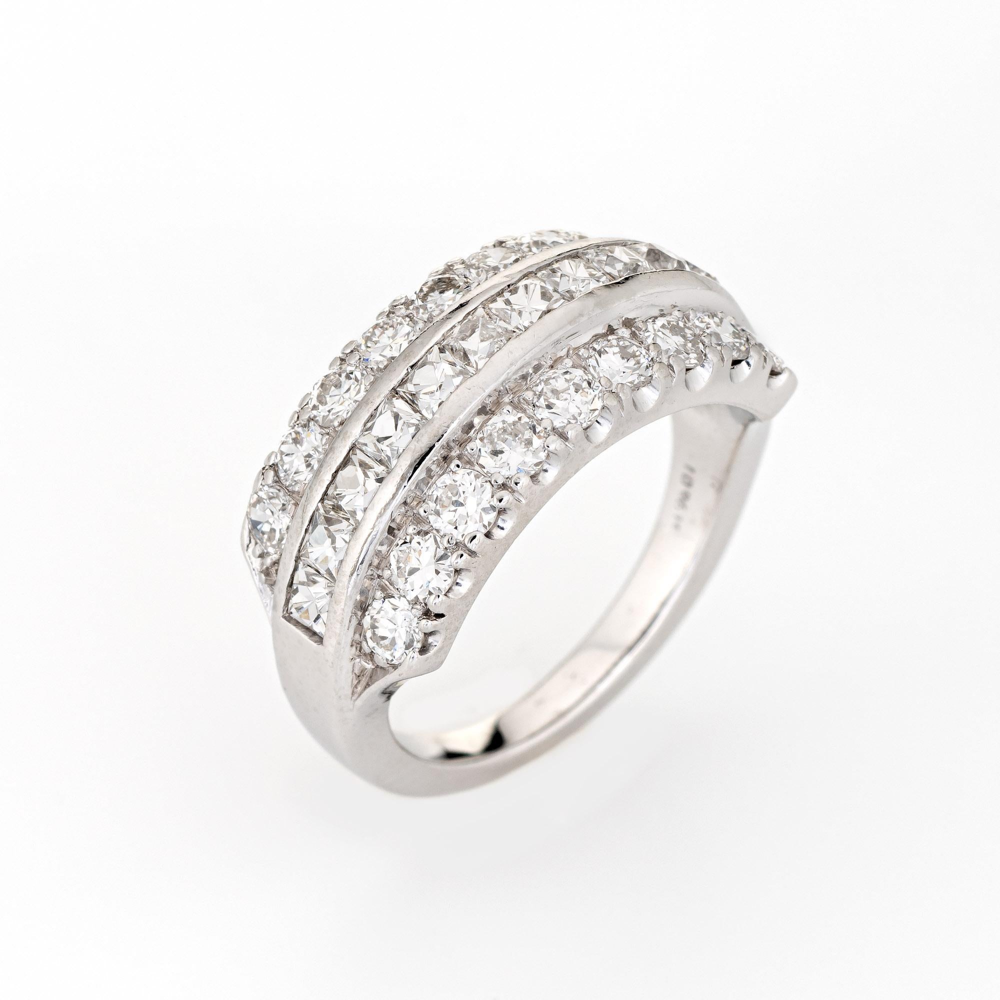 Finely detailed vintage mid-century diamond band (circa 1950s to 1960s) crafted in platinum. 

Center set French cut diamonds and round brilliant cut diamonds total an estimated 2 carats (estimated at G-H color and VS2-SI1 clarity).  

The stylish