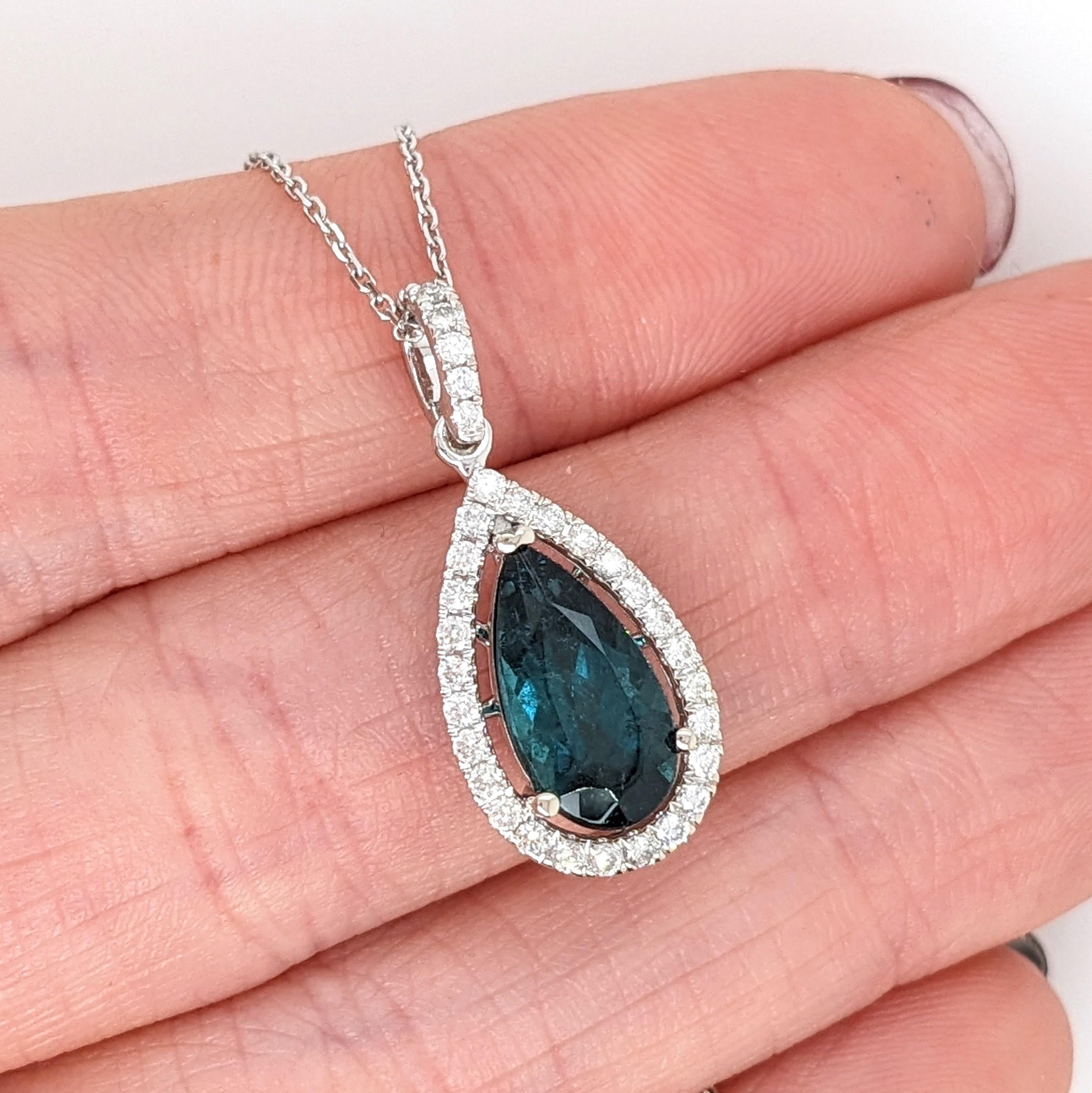 Stunning blue green Indicolite tourmaline Pendant in 14K white gold set with a beautiful natural earth mined diamond halo. Perfect for May birthstone and any special occasion! 

Specifications

Item Type: Pendant
Center Stone: Indicolite