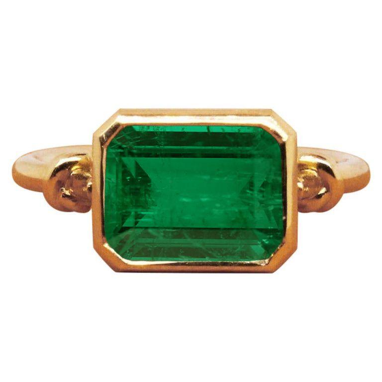 Emerald Cut 2ct Love Knot Emerald Ring in 18ct Yellow Gold