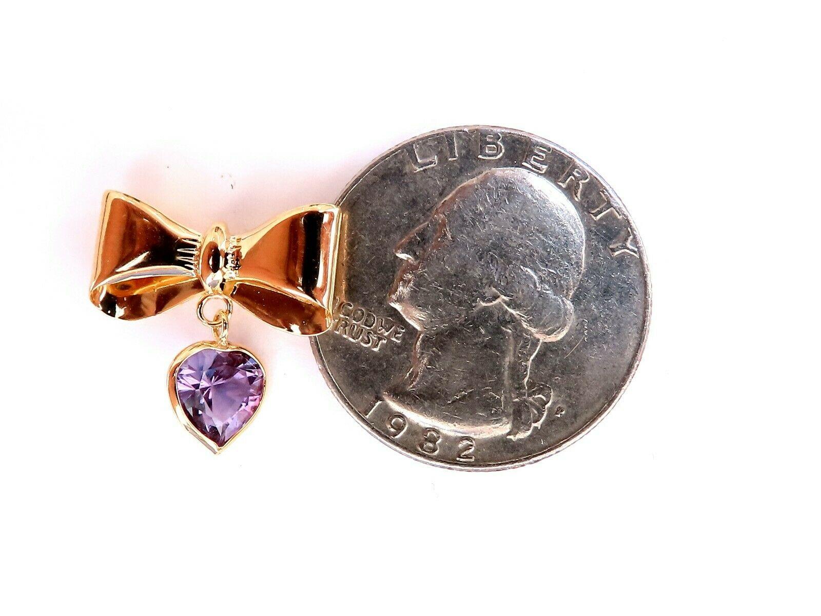 Natural Vivid Purple Amethyst Ribbon Earrings.

2ct natural vivid purple amethyst.

6x6mm each

14 karat yellow gold 1.8 grams

Overall earrings: 17 x17mm

Depth: 4mm
