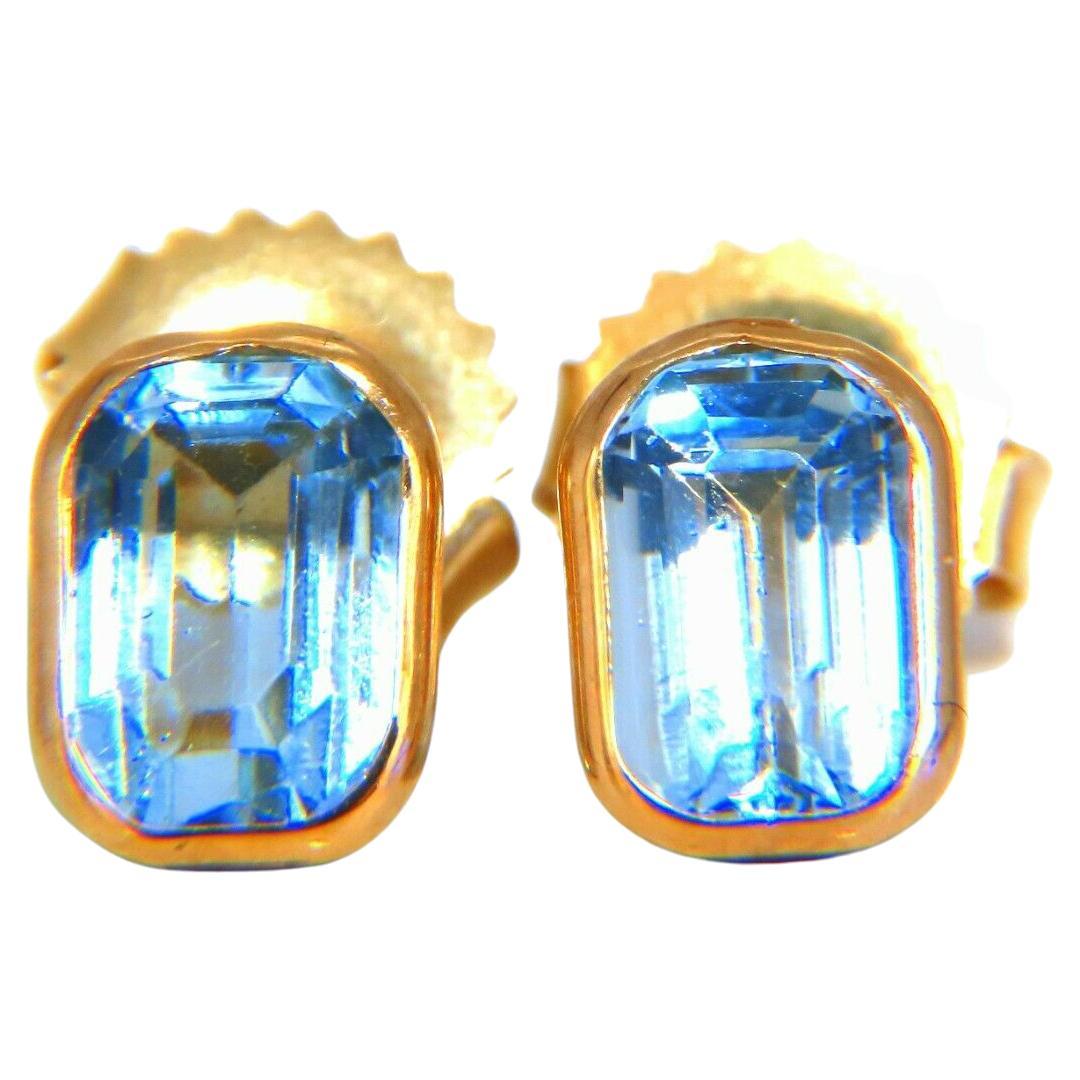 Clous d'oreilles en or 14 carats avec topaze bleu clair naturelle 2 carats