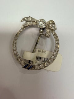 2ct Old Bow diamond brooch, platinum, year unknown