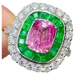 2ct Pink Sapphire Cocktail Ring with 1ct Emerald 
1ct White Diamond Halo in PT9