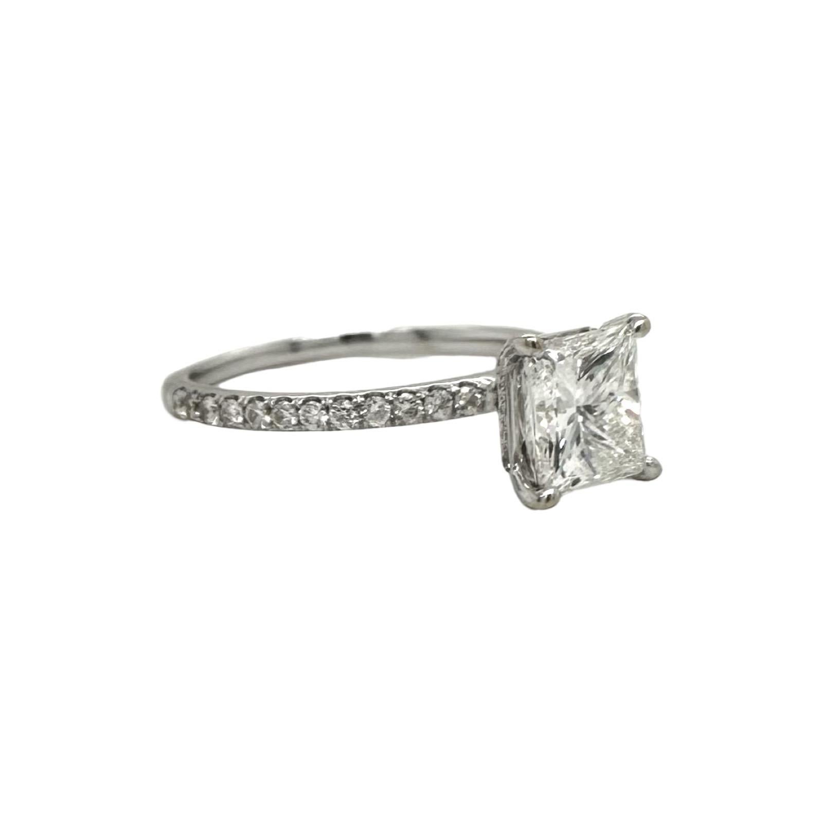 Style: Engagement Ring
Material: White Gold
Center Stone: Princess-cut Diamond
Center Stone Color: I
Center Stone Clarity: SI2
Center Stone Carat Weight: approx. 2 ct
Side Stones: approx. 0.2ct
Sizable: Yes