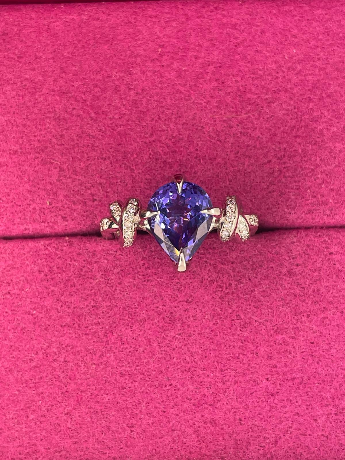 For Sale:  2ct tanzanite and diamond ring in platinum and rose gold  Forget me knot ring  7