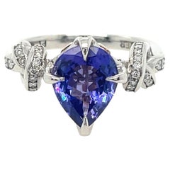 Bague en platine et or rose avec tanzanite et diamants de 2 carats  Bague à nœuds "Oubliez-moi 