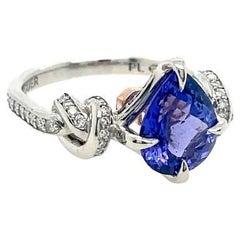 Anello con tanzanite e diamante da 2 carati "Forget Me Knot" in platino e oro rosa