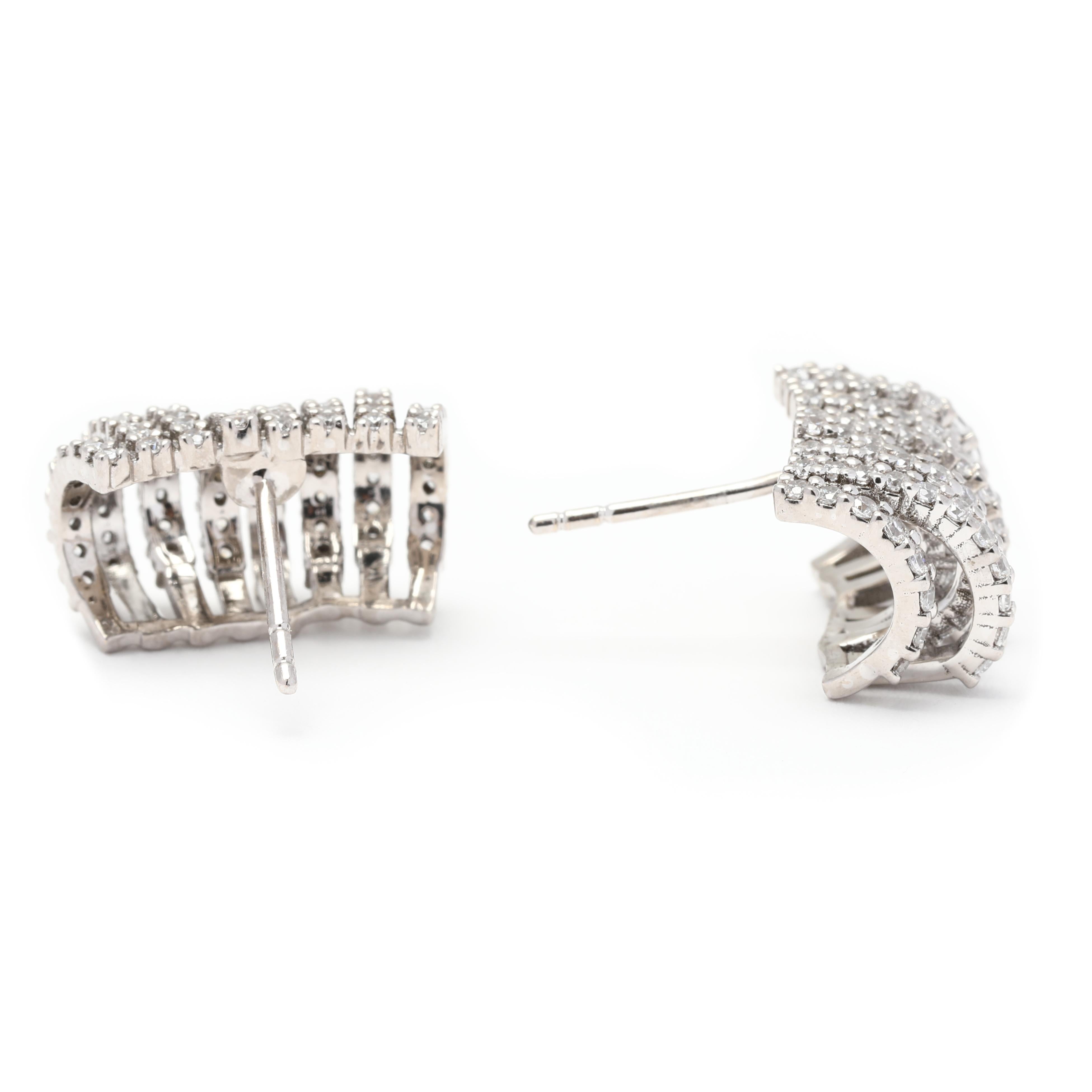 These exquisite Cubic Zirconia Multi Row Huggie Hoop Earrings are the perfect accessory for adding a touch of sparkle and glamour to any outfit. Made from 14K white gold, these earrings feature multiple rows of small cubic zirconia stones, creating
