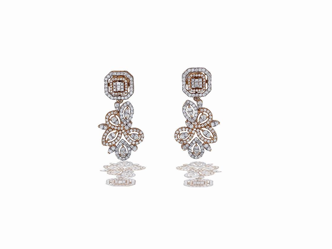 This stunning dangle diamond earring pair has a classic design incorporated into a fun and modern orientation and gold combination.  These earrings have over 241 round brilliant diamonds that range in size from 1.2 -2.0 mm and exhibit a color and