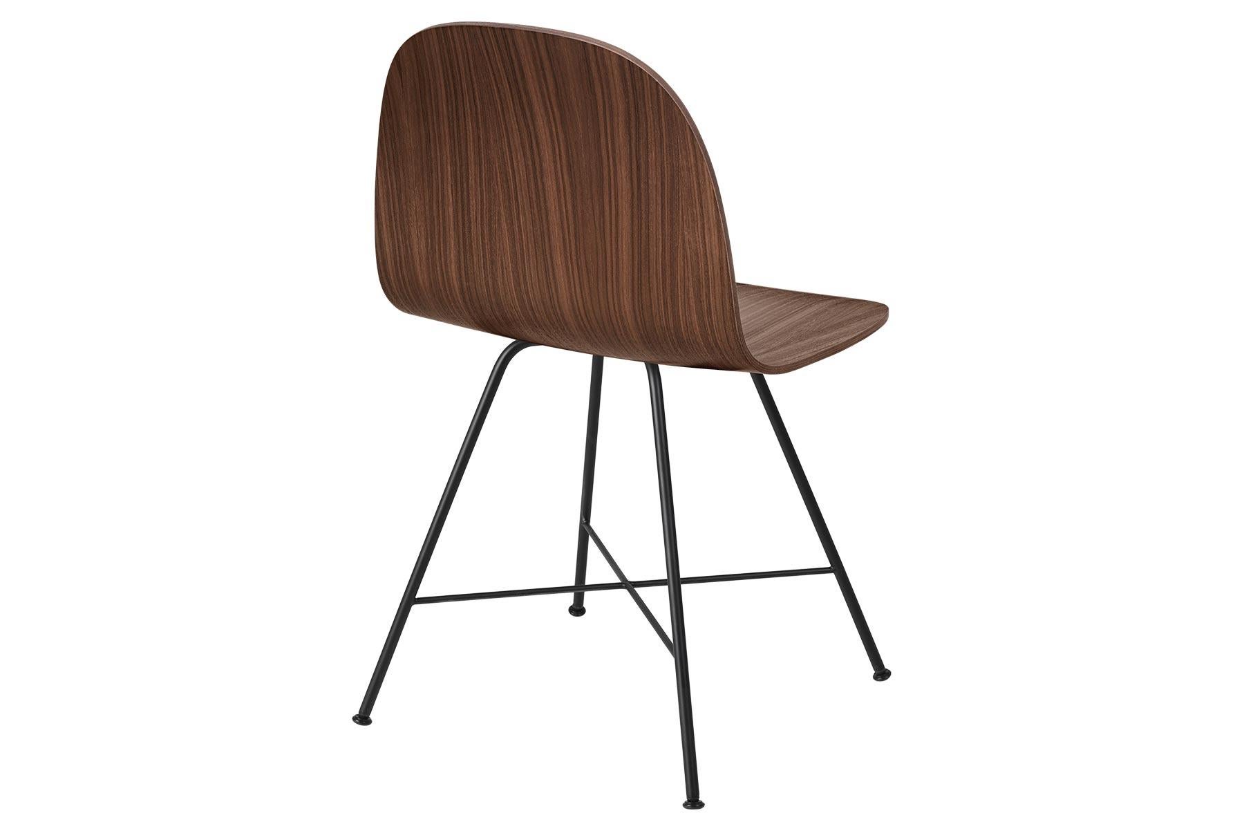 The Gubi 2D chair is a series of light dining chairs made from laminated veneer with options for front upholstery in a wide range of fabrics and leathers, suitable for both private and public spaces. Being an extension to the Classic Gubi 3D chair,