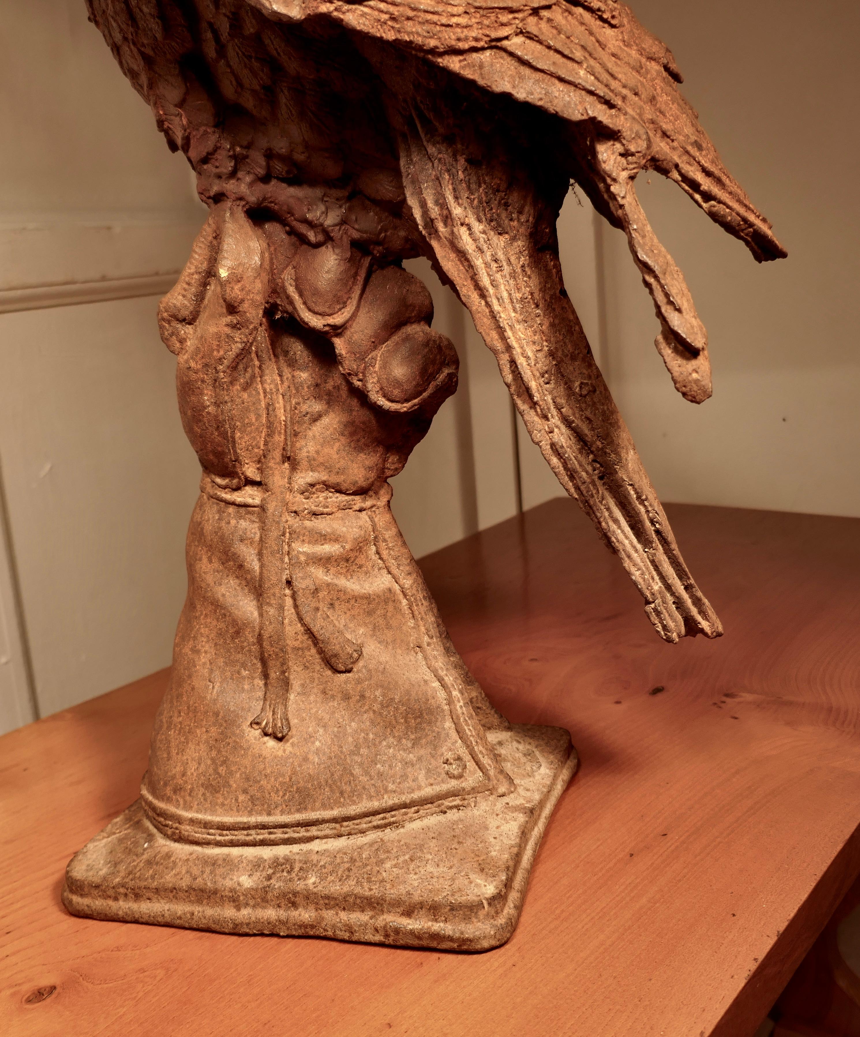 Late 19th Century Weathered Cast Iron Statue of a Falcon on a Gloved Hand For Sale
