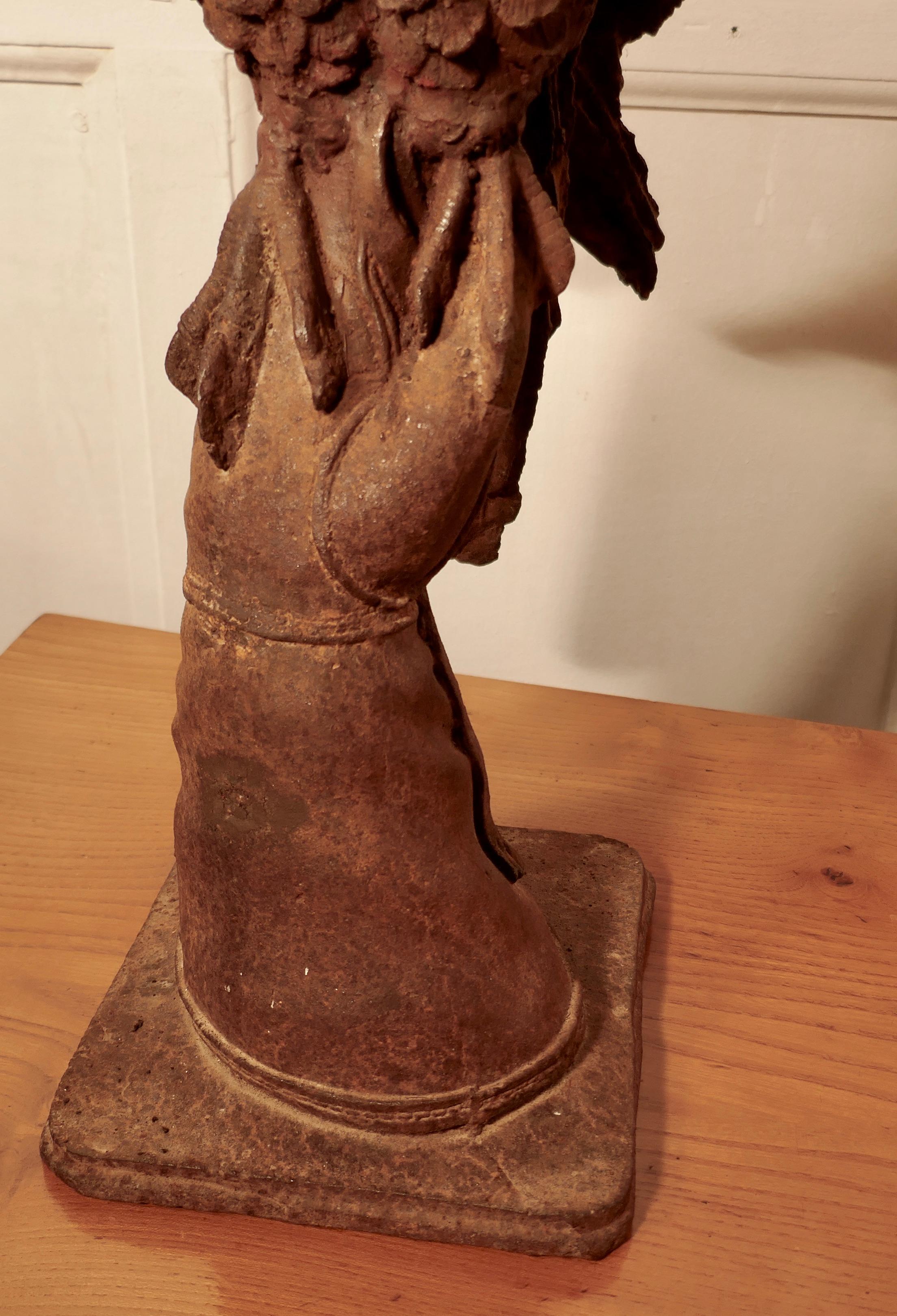 Weathered Cast Iron Statue of a Falcon on a Gloved Hand For Sale 3