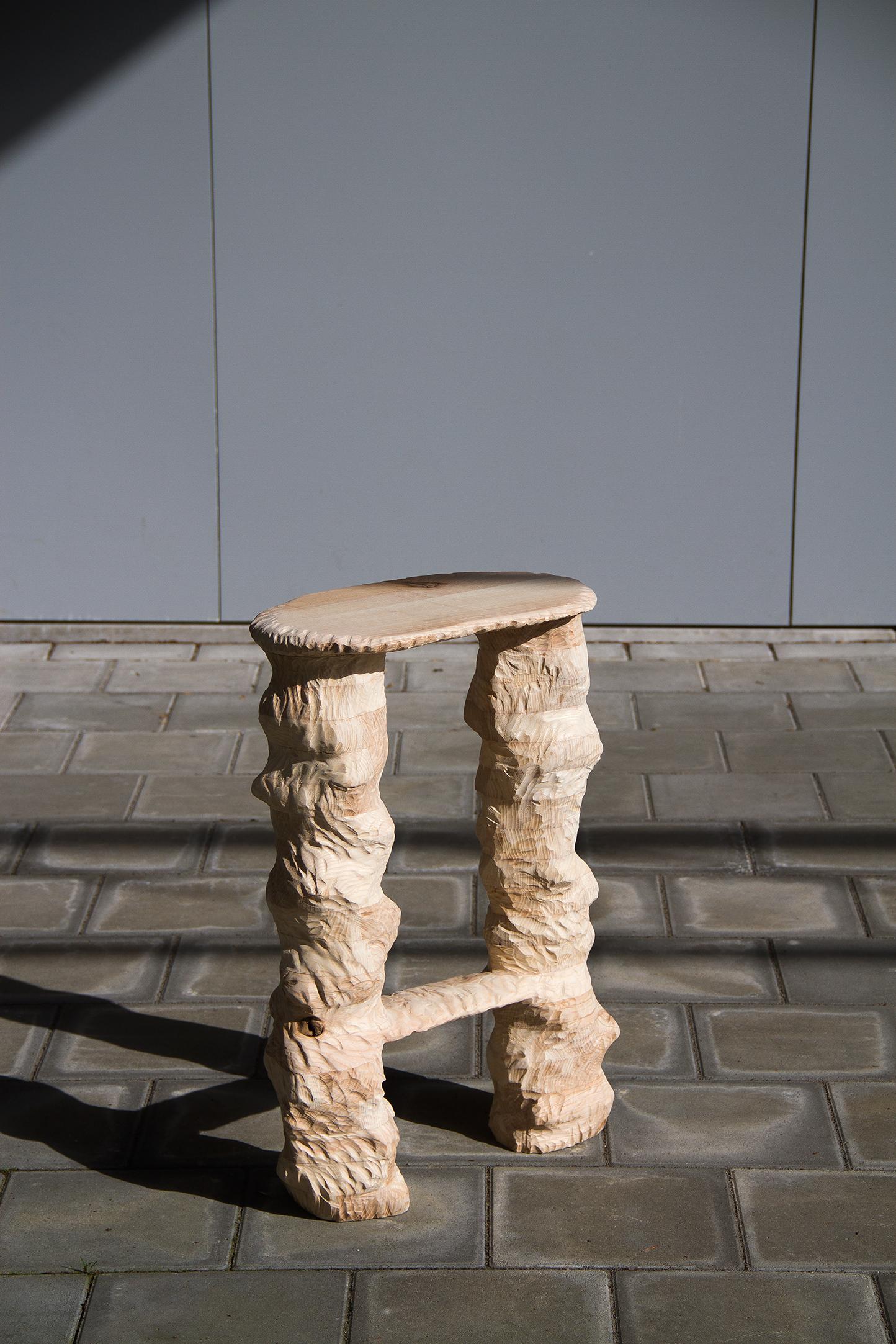 Series of stools designed and handcrafted in the Netherlands by Tellurico Design Studio using only high-quality woods. 
The three stools are inspired by the ancient technique of wood carving and adapted to the contemporary aesthetic. This
