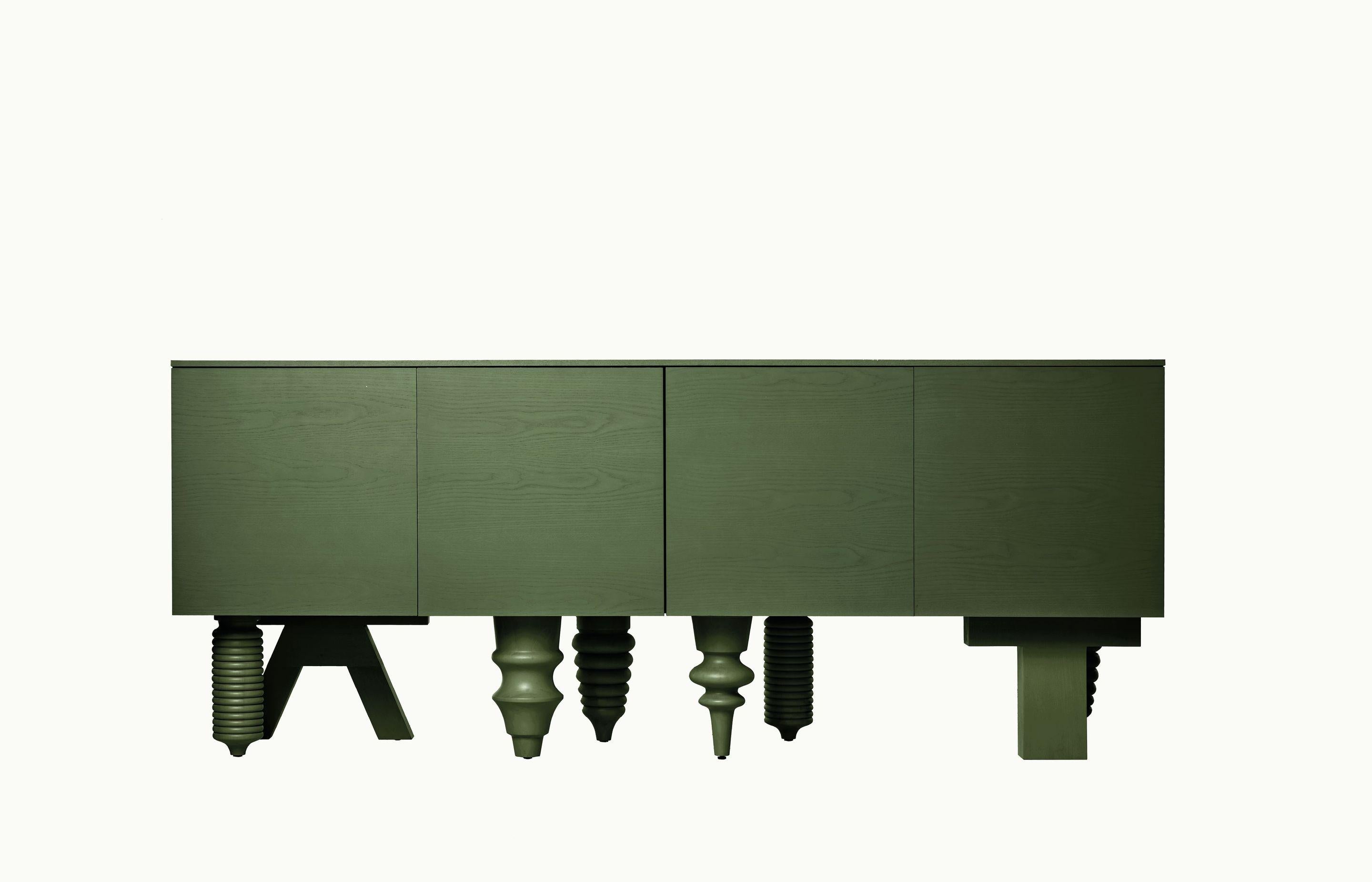 2M Multileg Cabinet in Olive Green by Jaime Hayon for BD Barcelona

It can be uniquely configured with twelve elaborate leg options, customisable finishes and colours, and a multitude of interior storage variations. The Multileg is disciplined and