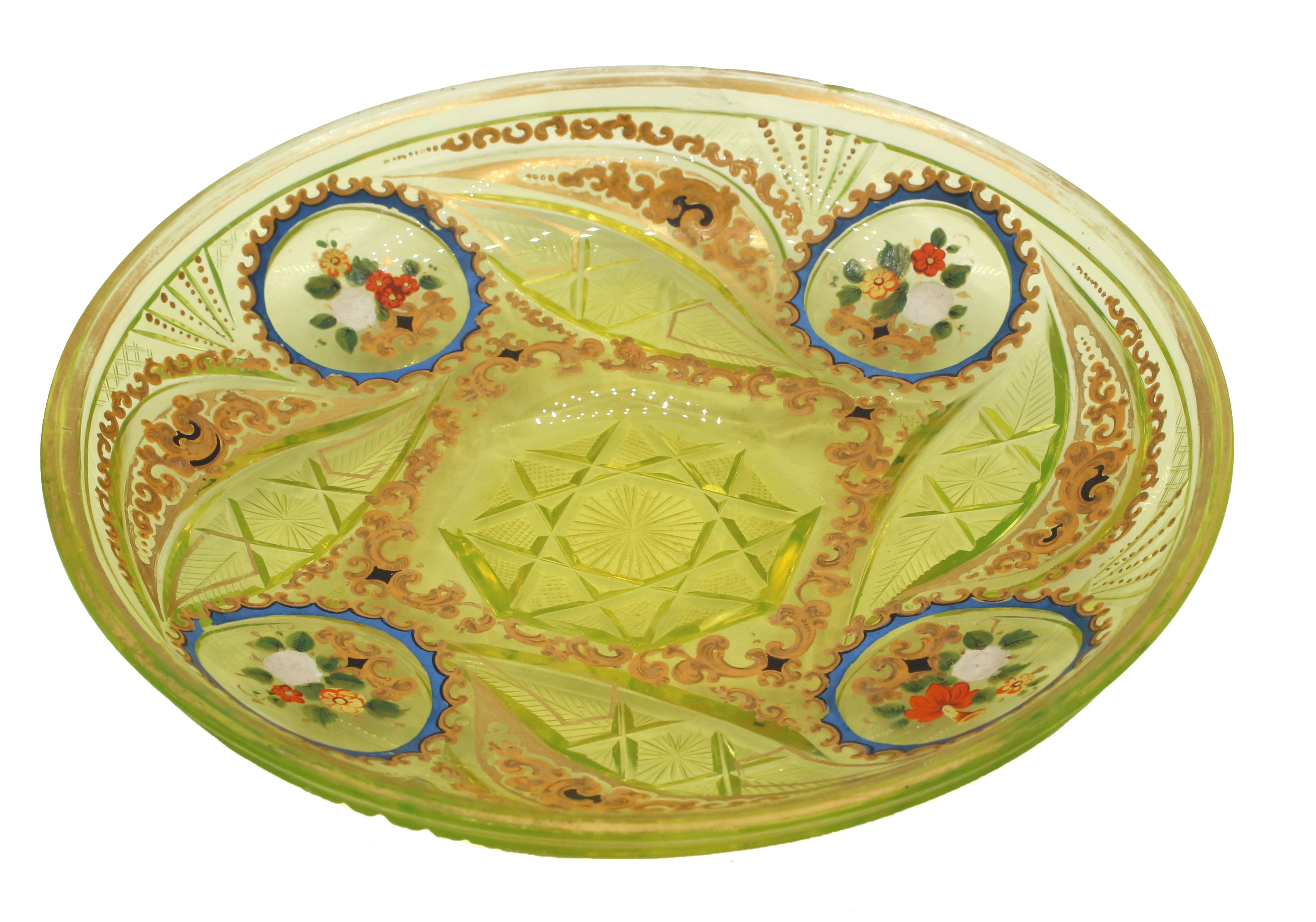2nd half 19th century Bohemian vaseline glass  (also called Uraline or Ouraline glass) serving plate. Blown & cut, then enameled & gilded. Central octagonal indentation - may have been the stand to another piece. Two small border chips & some