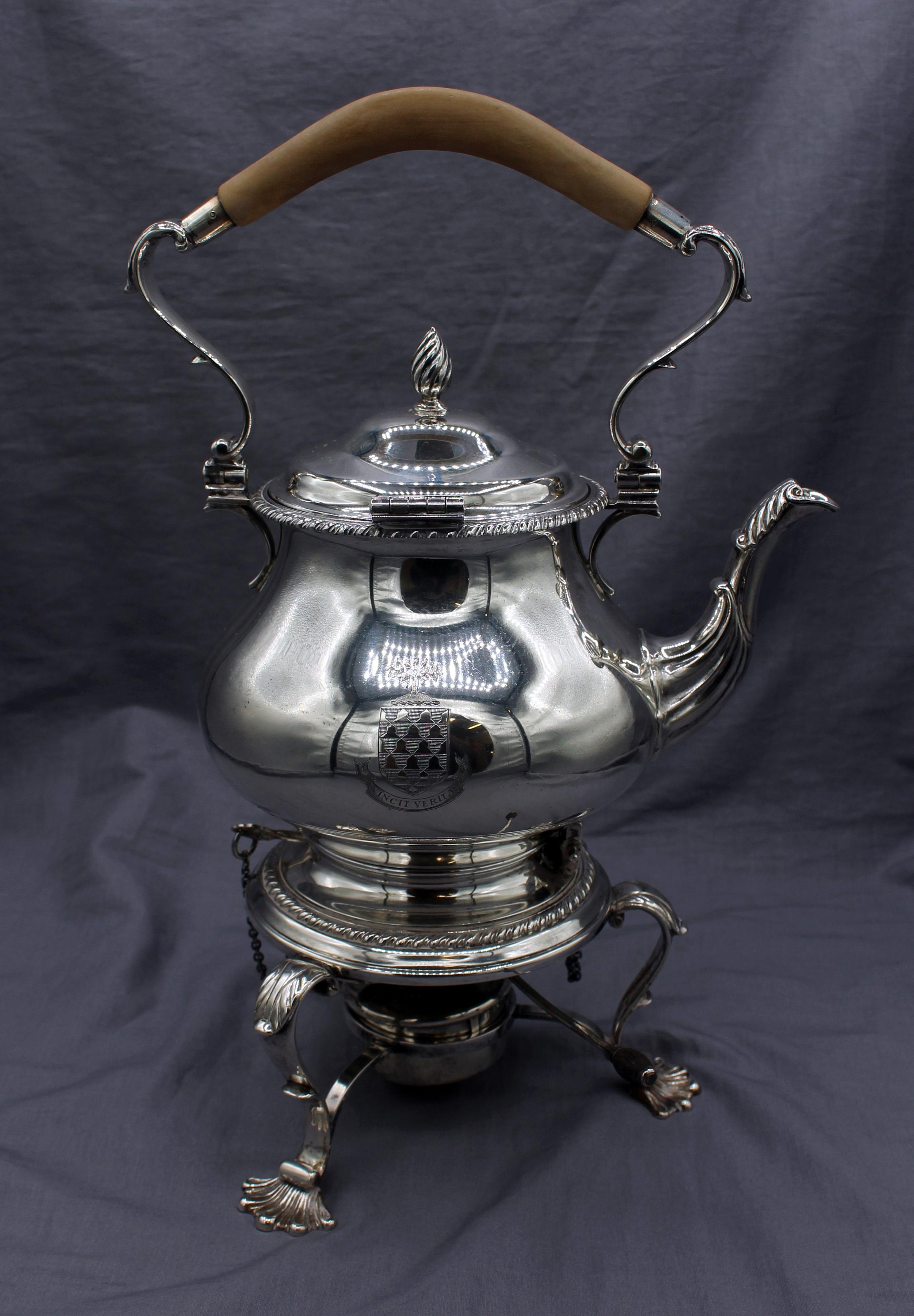 2nd quarter 20th century 6-piece sterling silver tea & coffee service by Robert Ensko Inc., NYC. Kettle on stand, coffee pot, tea pot, cream, covered sugar, waste bowl. An armorial crested set for The Haskell Family, an American family of