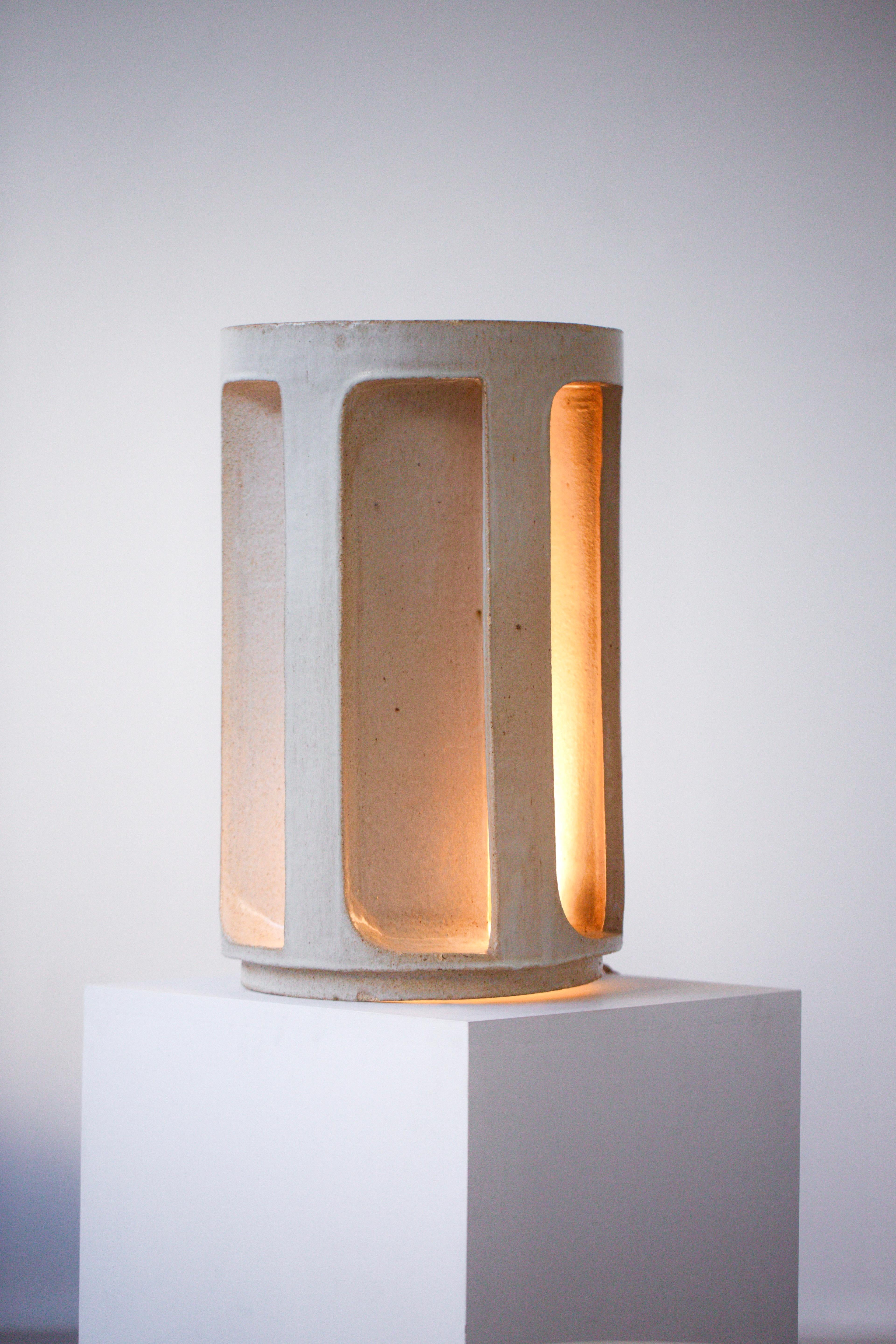 A unique beige glazed ceramic lamp. Large piece, circa 1970, signed below Pierre Bareff (probably Guy Bareff's family), France. Very good vintage condition. This work recalls in a significant way the iconic vocabulary that characterized the œuvre of