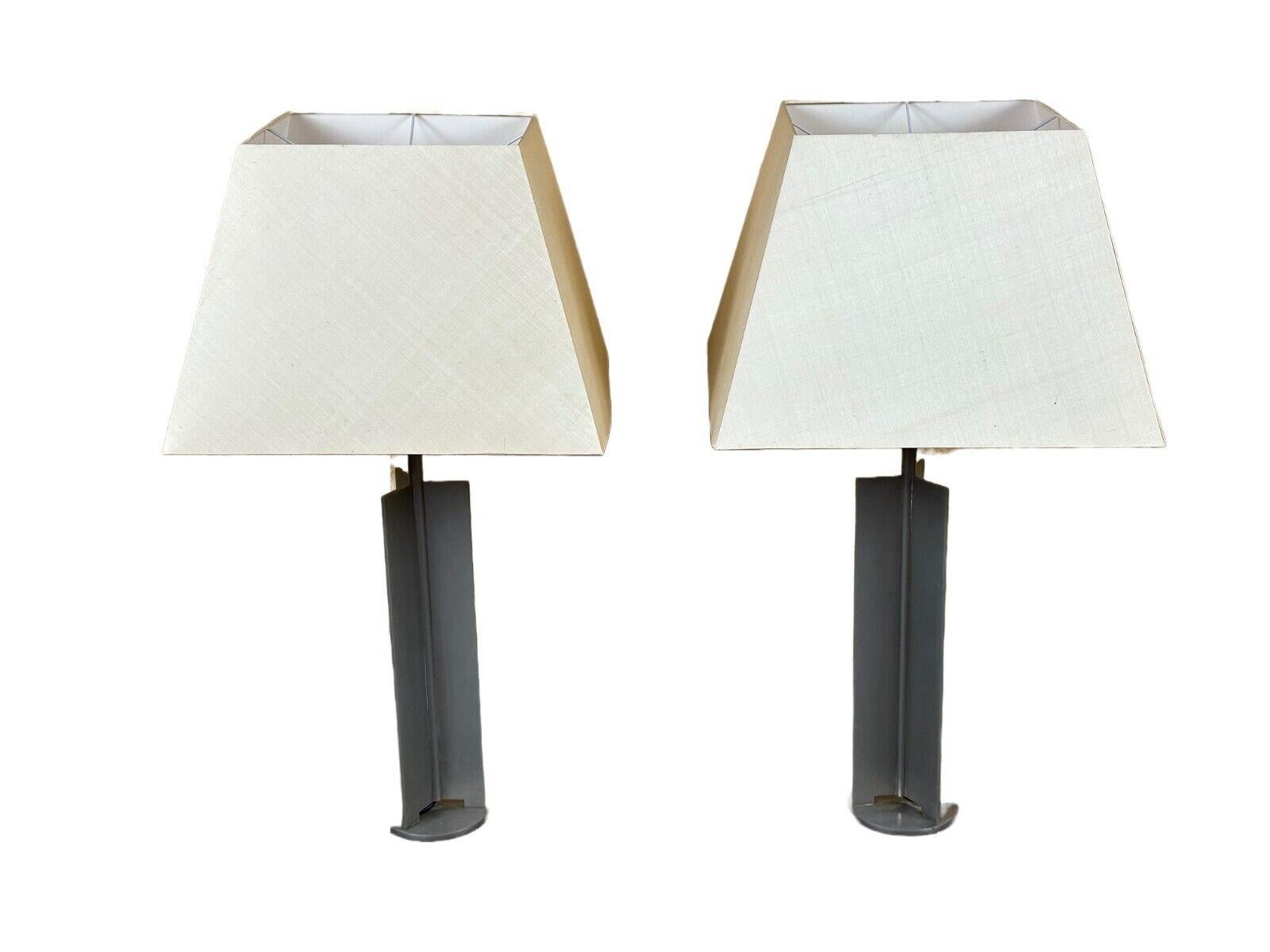2x 60s 70s XL table lamp table lamp aluminum metal space age design

Object: 2x table lamp

Manufacturer:

Condition: good - vintage

Age: around 1960-1970

Dimensions:

Width = 42cm
Depth = 42cm
Height = 79cm

Other notes:

2x E27 socket - per