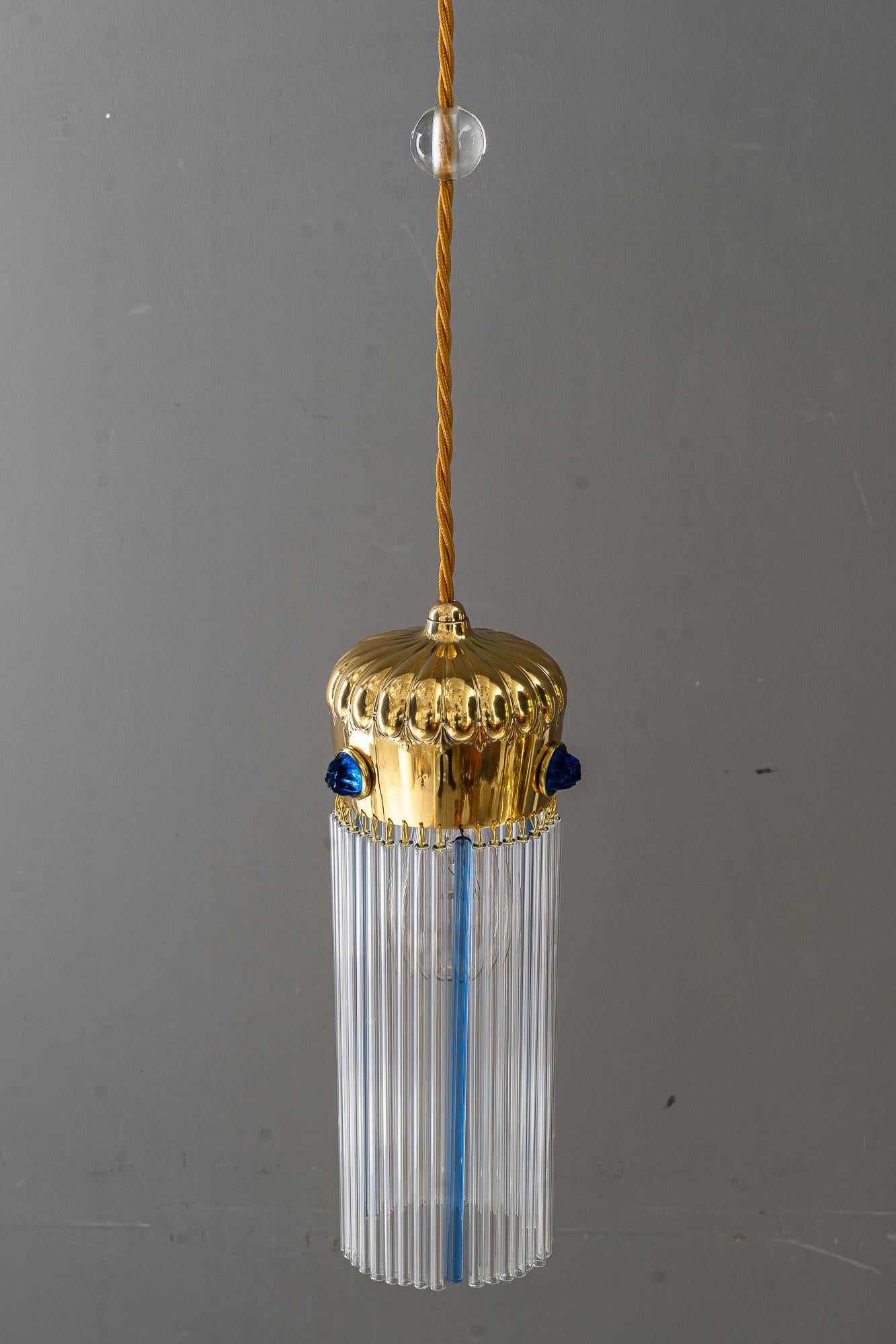 2x Art Deco pendants with glass sticks vienna around 1920s
3x original old blue opaline glass
Polished and stove enameled
The clear glass sticks are replaced ( new )
The blue glass sticks are original old 
We can change the hight to fit your room