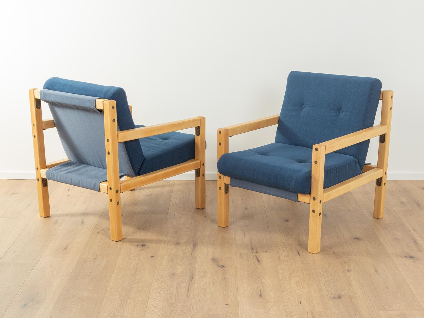 Rarely armchairs from the 1970s for Flötotto. High-quality solid beech frame. The armchairs have been reupholstered and covered with a high-quality upholstery fabric in blue. The offer includes two armchairs.

Quality Features:
 very good
