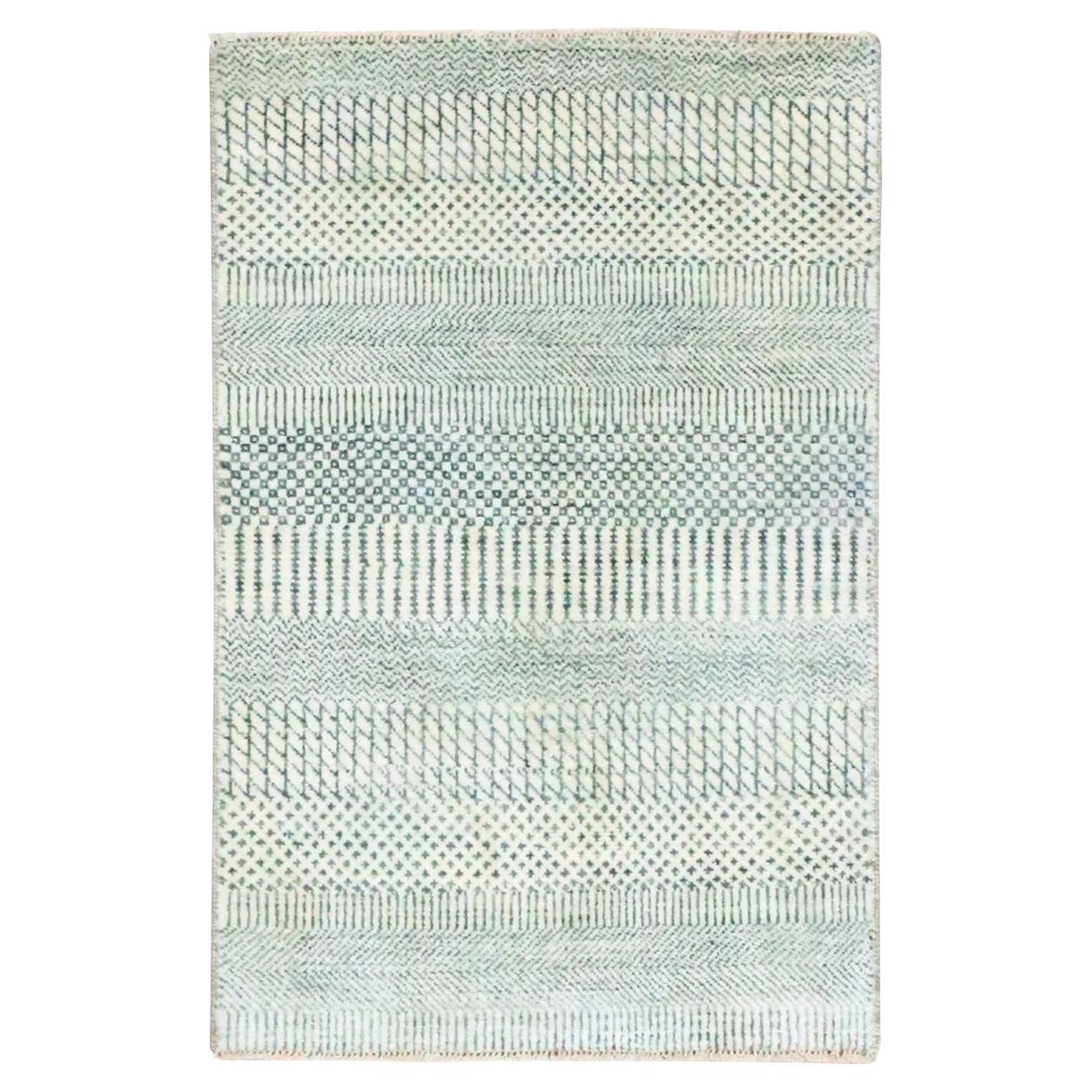 Tappeto beige-grigio 2
x3
annodato a mano in lana con seta, dal design moderno a erba.