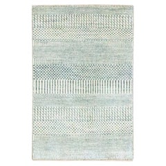 Tappeto beige-grigio 2
x3
annodato a mano in lana con seta, dal design moderno a erba.