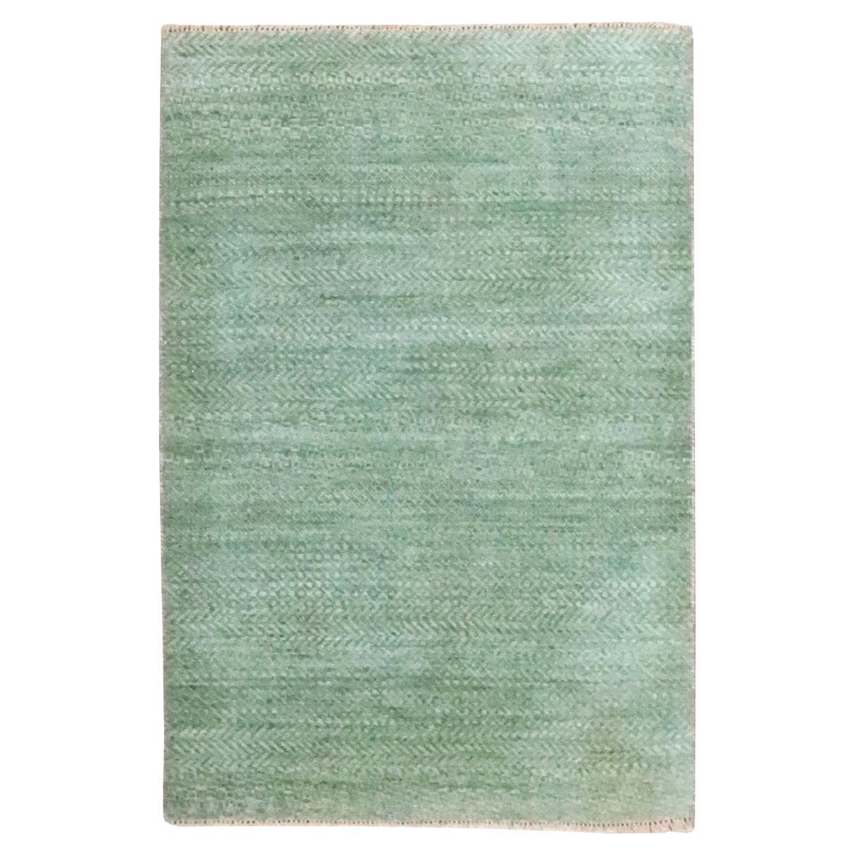 2
x3
Tapis noué à la main en laine naturelle vert viridien avec un design moderne d
herbe