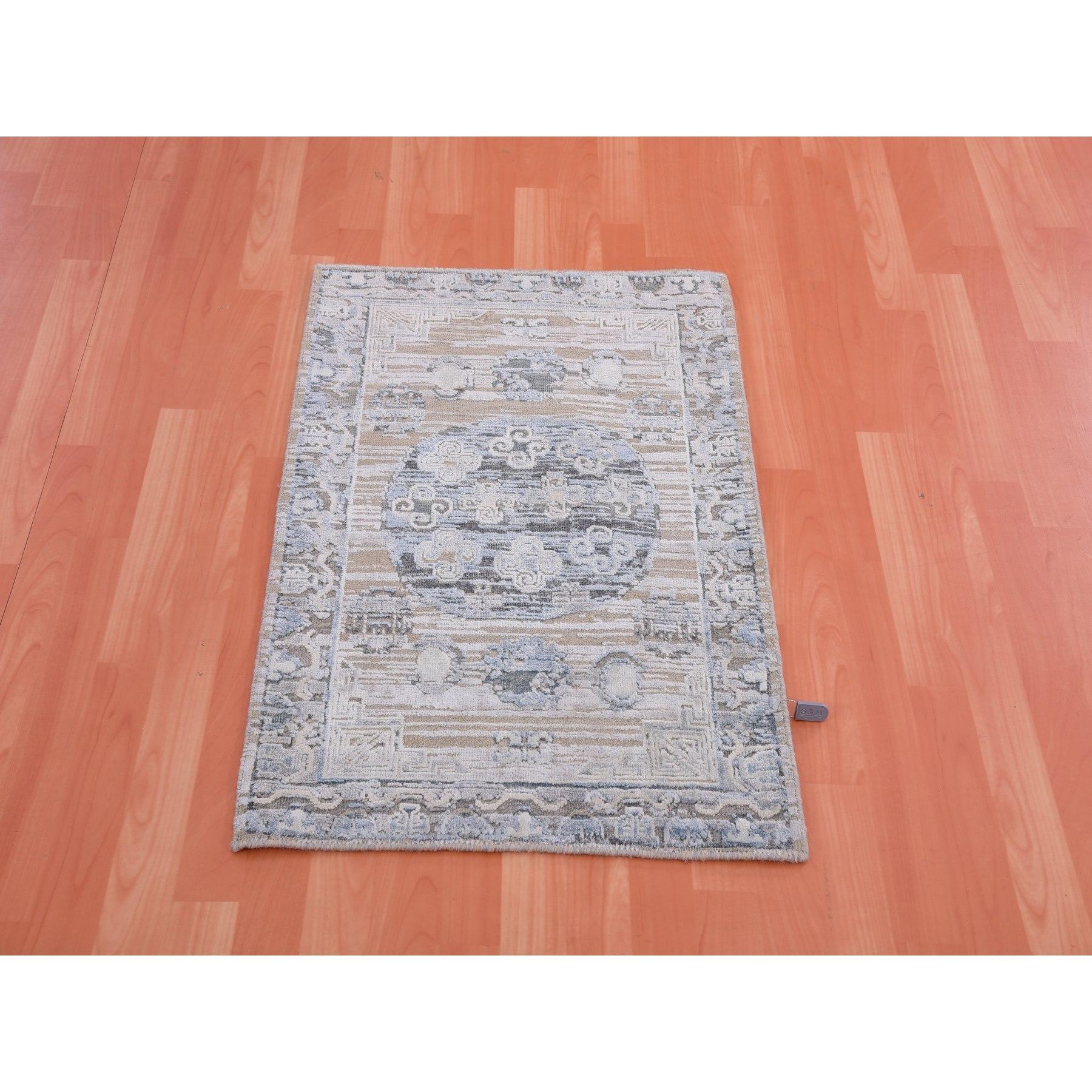 This is a truly genuine one-of-a-kind Pure Silk with Textured Wool Khotan Design Hand Knotted Oriental Rug. It has been woven for months and months in the centuries-old Persian weaving craftsmanship techniques by expert artisans.
Primary materials: