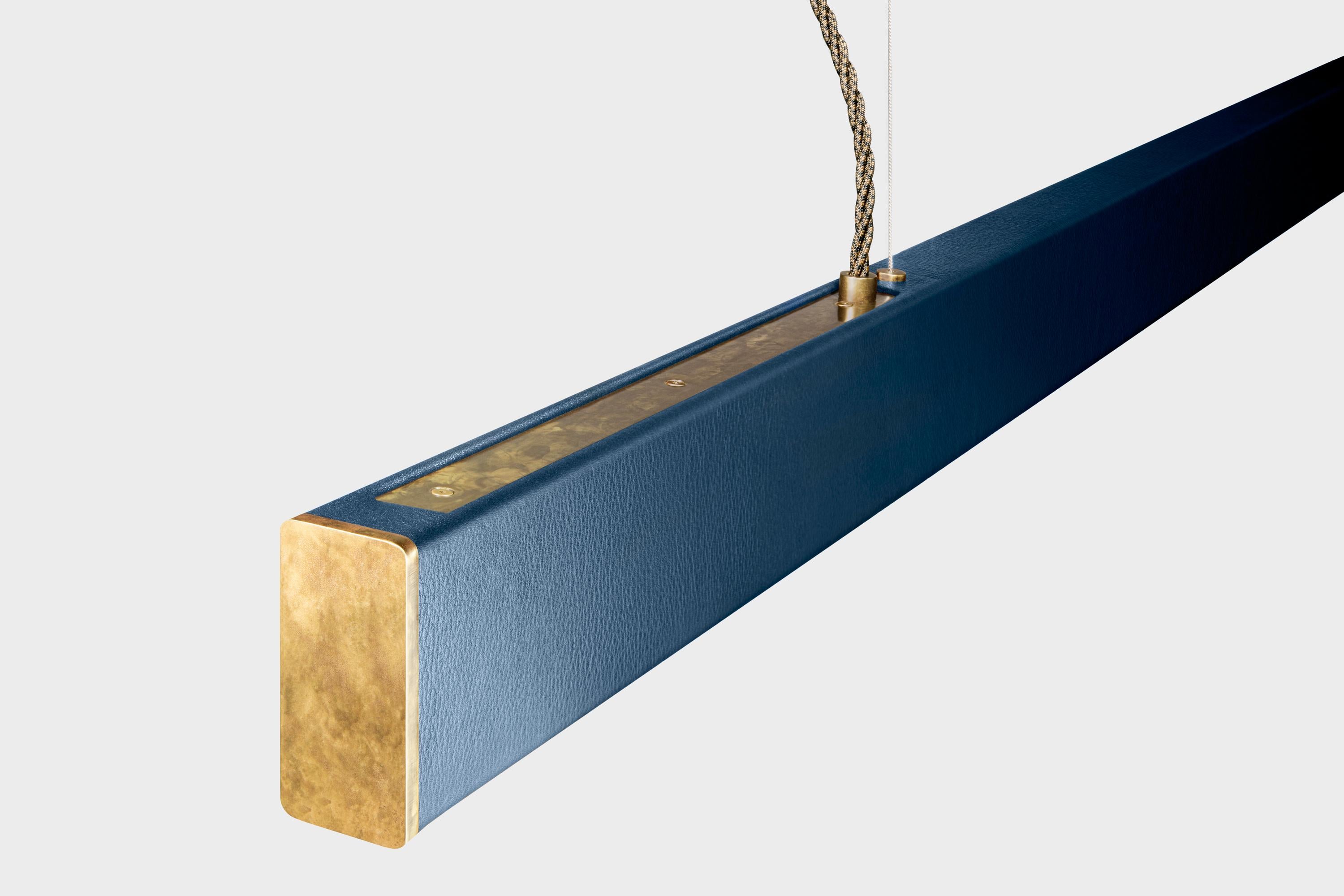 Remaining true to its roots while embracing new materials, the Leather 2x4 is a reimagining of our signature 2x4 Pendant. The classic metal hardware is accentuated by lush hand cut leather finishes, creating a sophisticated pendant that draws the