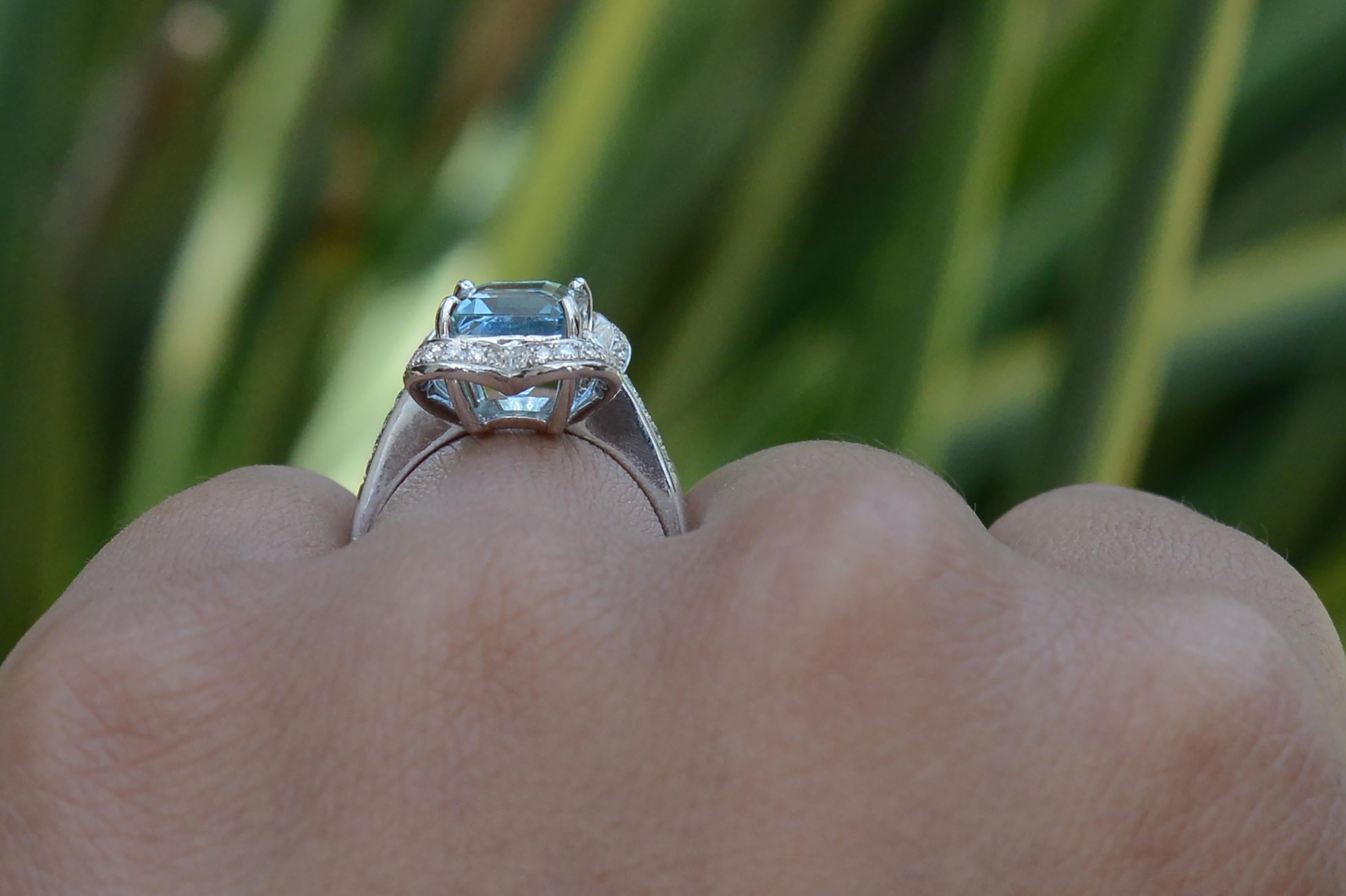 Contemporary Vintage Emerald Cut Aquamarine Alhambra Engagement Ring For Sale